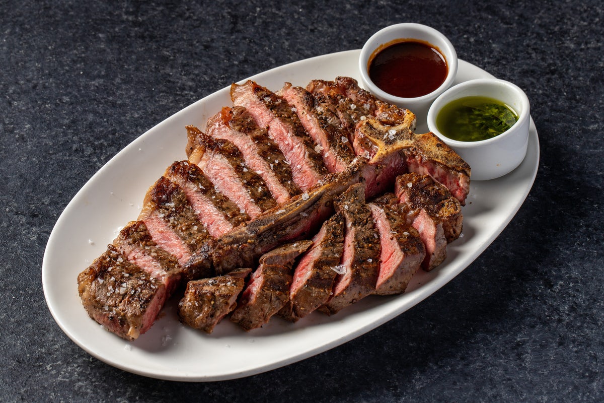 Order Dry-Aged Porterhouse 28oz food online from Stk Steakhouse store, Chicago on bringmethat.com