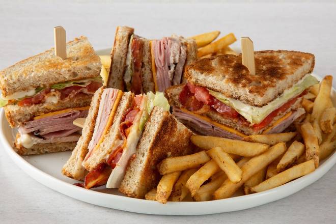 Order Double Decker Club food online from Village Inn store, Des Moines on bringmethat.com