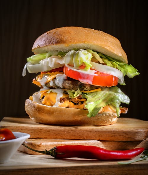 Order Exotic Double Cheeseburger food online from Mothership Pizza store, Houston on bringmethat.com
