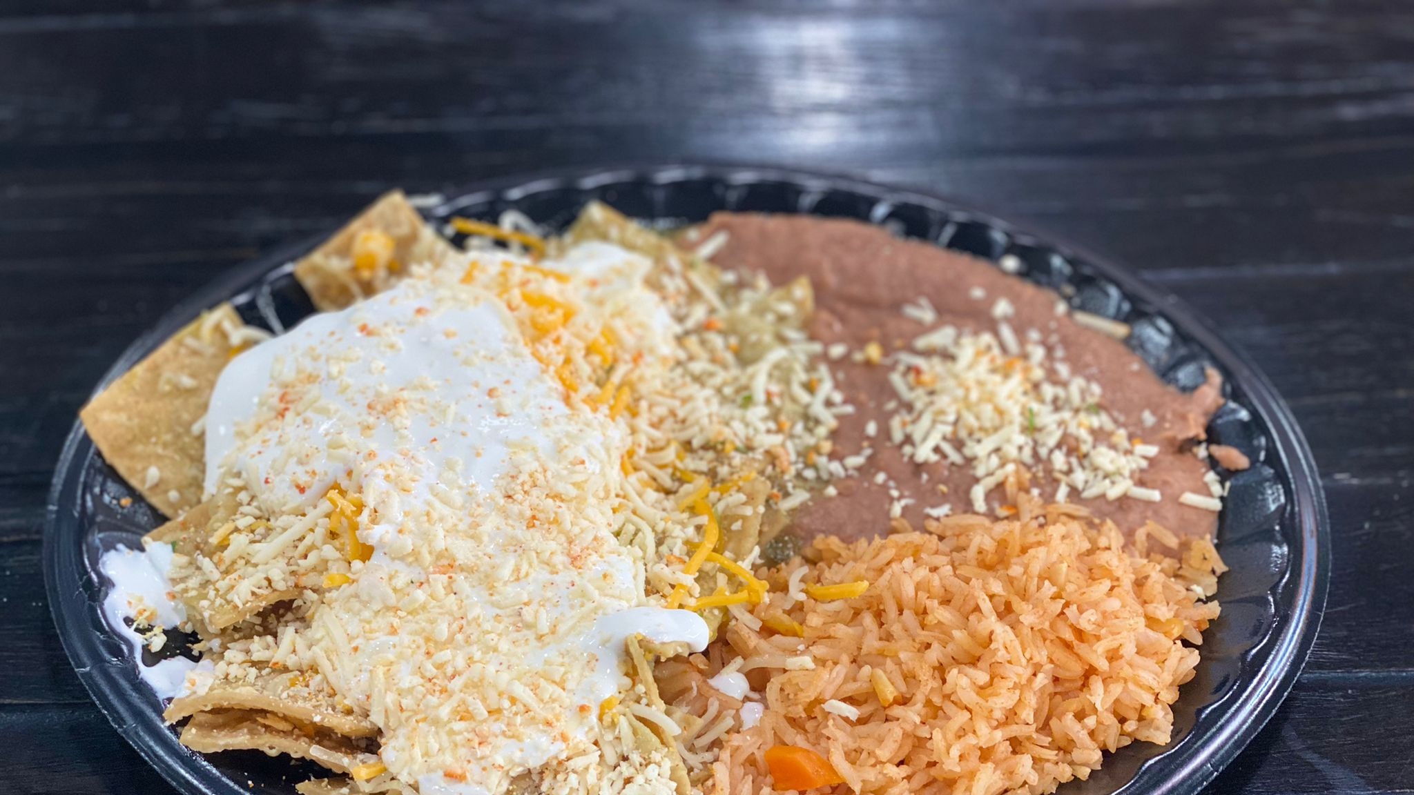 Order * Chilaquiles food online from Burros & Fries store, Chula Vista on bringmethat.com