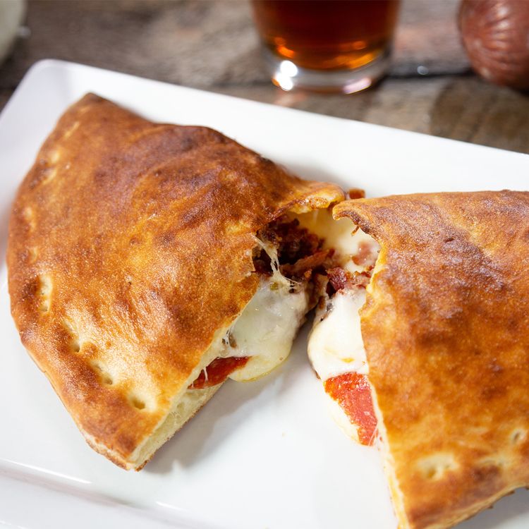Order Meat Calzone food online from Parrys Pizza store, Englewood on bringmethat.com