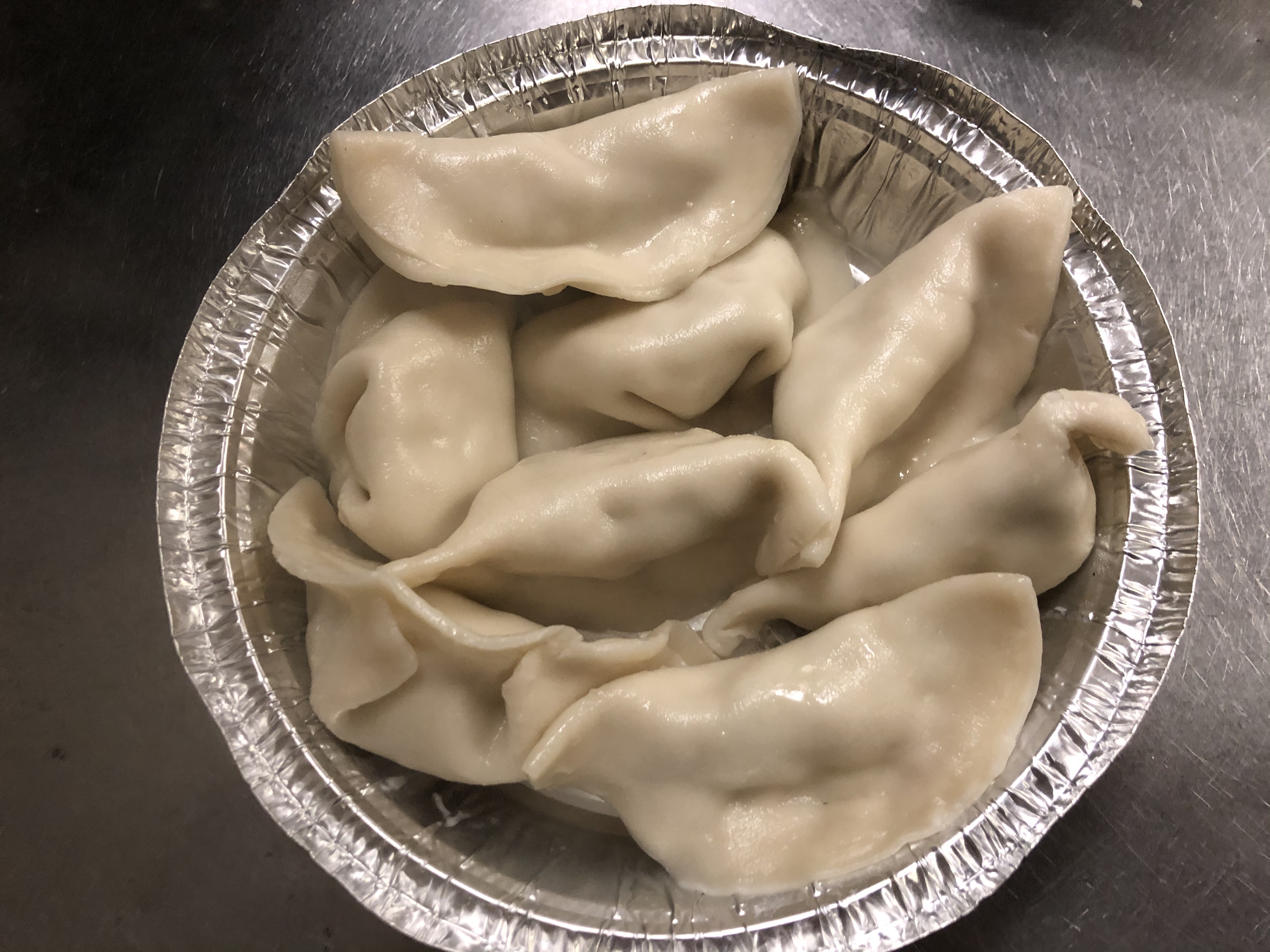 Order 8 Chicken Spinach Dumplings food online from Yan Asian Restaurant store, Rutherford on bringmethat.com