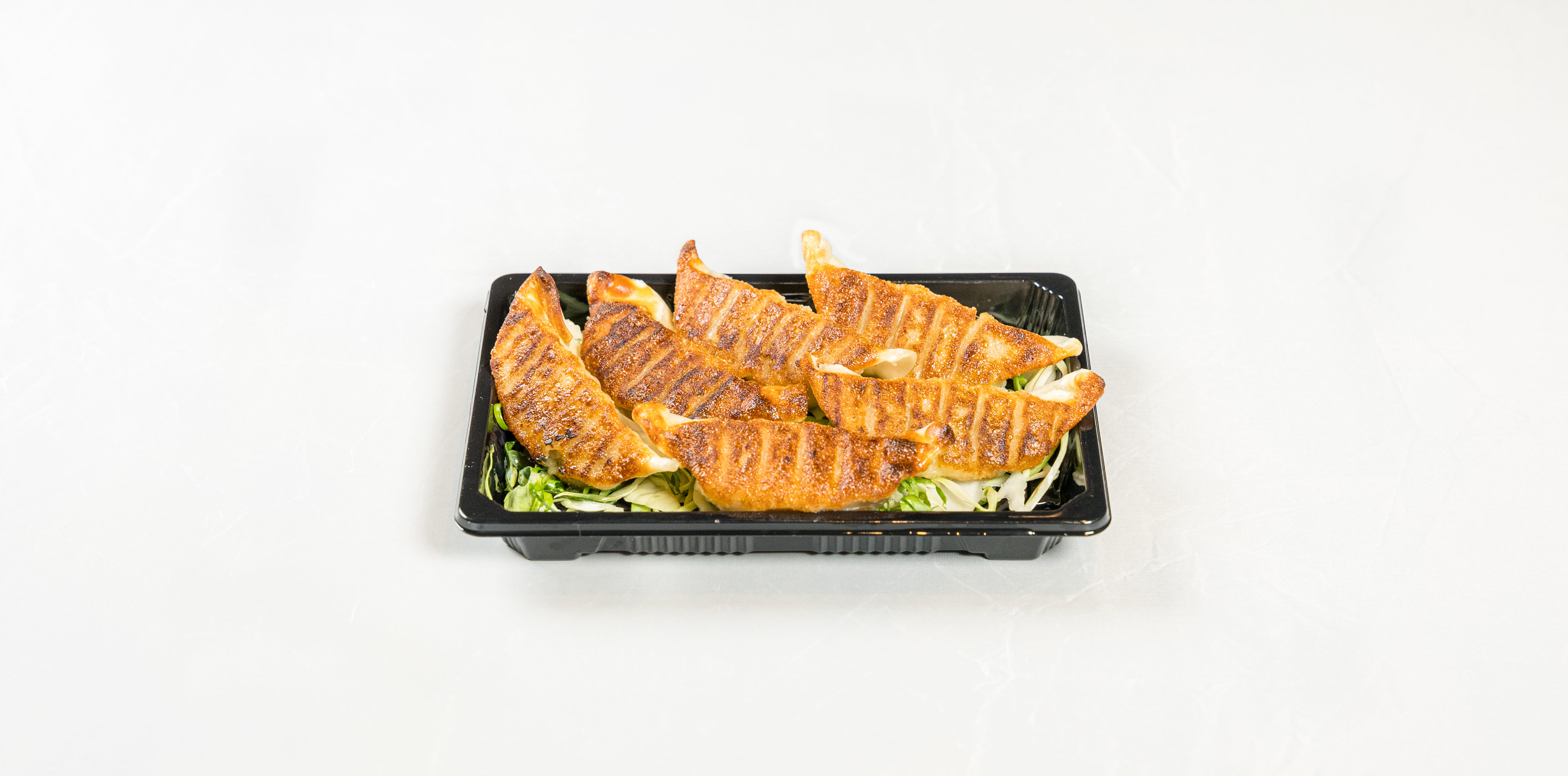 Order Gyoza food online from Sushi & More store, Alameda on bringmethat.com