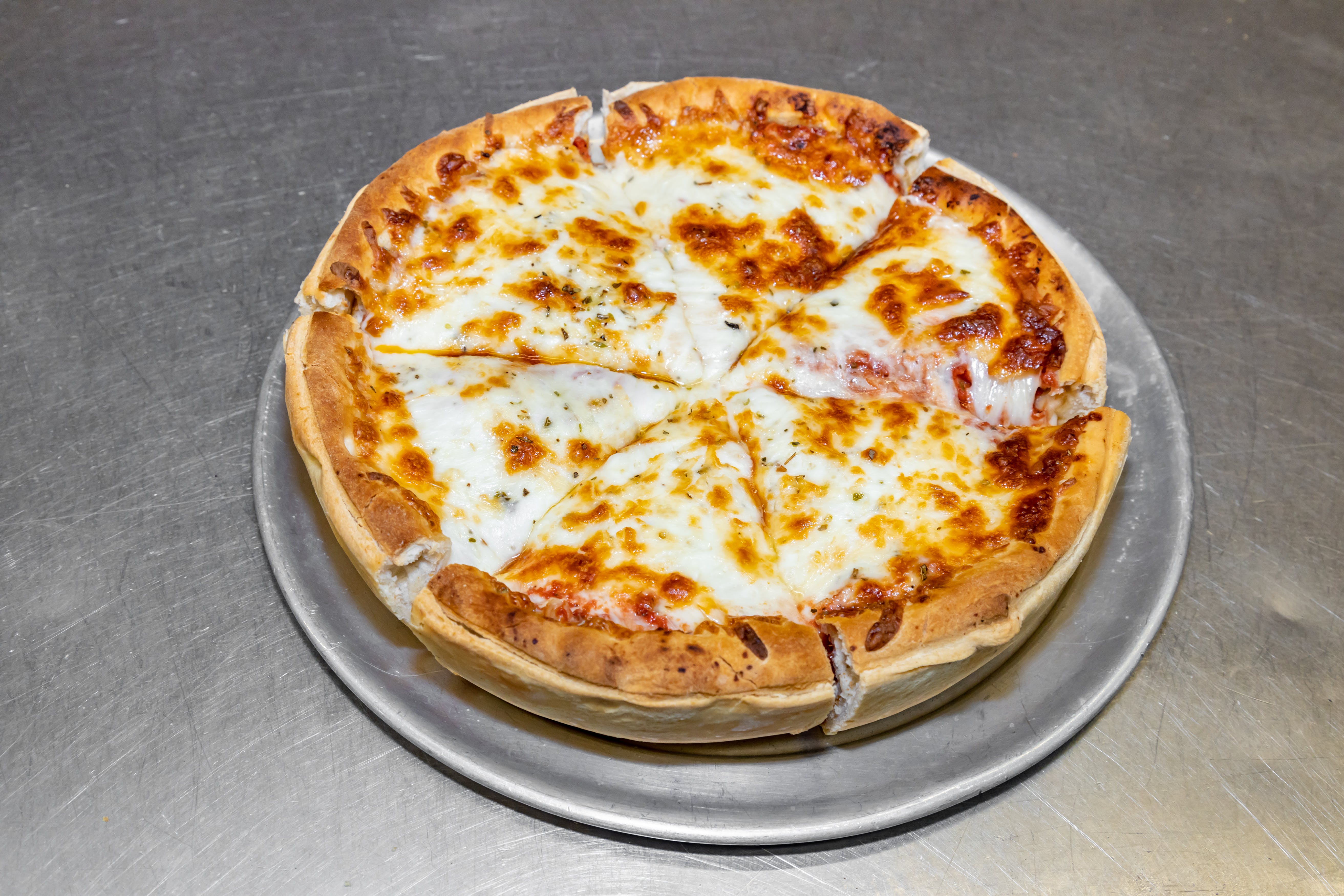 Order Deep Dish Double Crust Cheese Pizza - Small 10" (Serves 2-3) food online from Luconi's Pizza store, Bradley on bringmethat.com