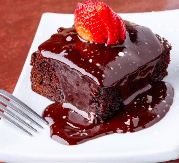 Order Warm Chocolate Ganache Cake food online from Tuscany Bistro store, League City on bringmethat.com