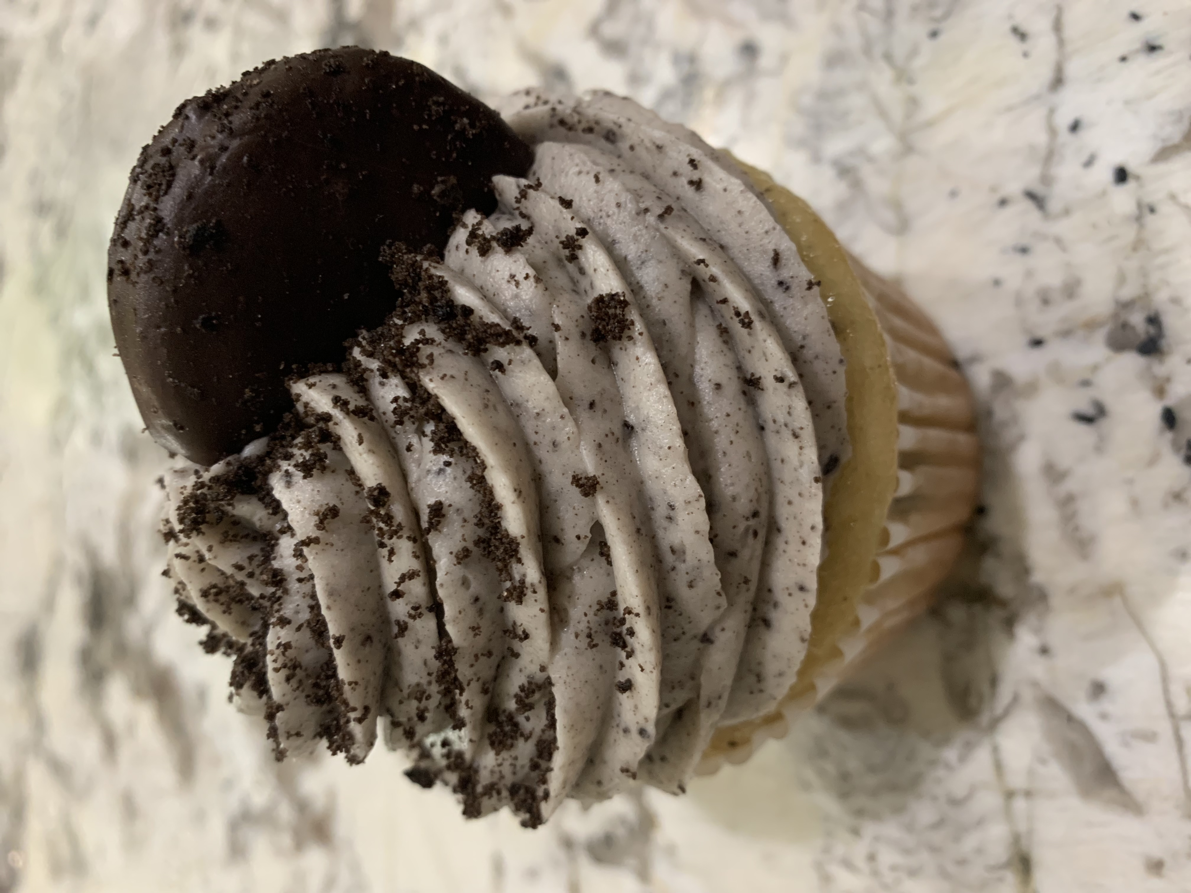 Order Cookies and Cream Jumbo Cupcake food online from Salerno's Restaurant & Pizzeria store, Gilbert on bringmethat.com