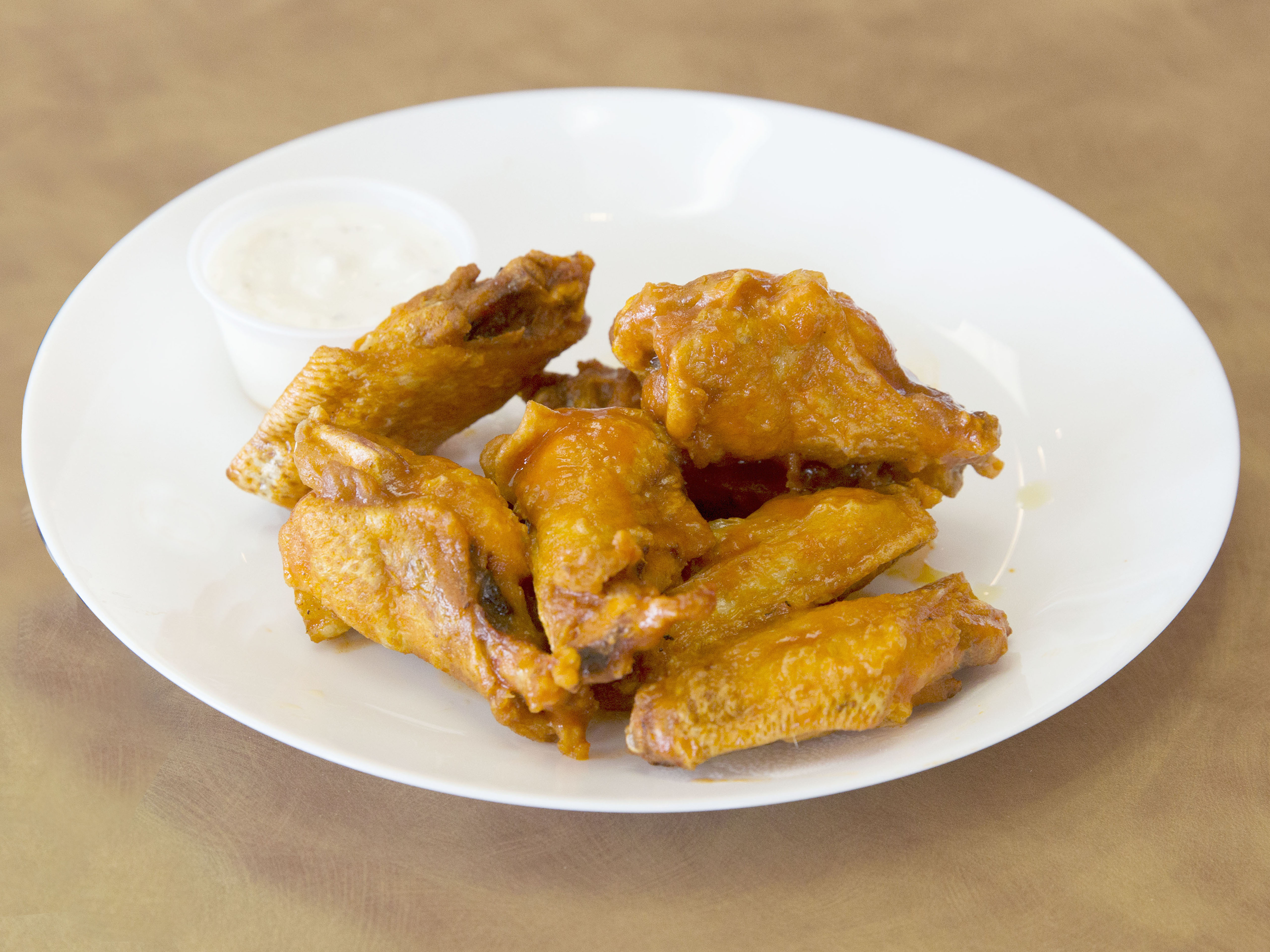 Order Wings food online from Pudge Bros. Pizza store, Seattle on bringmethat.com