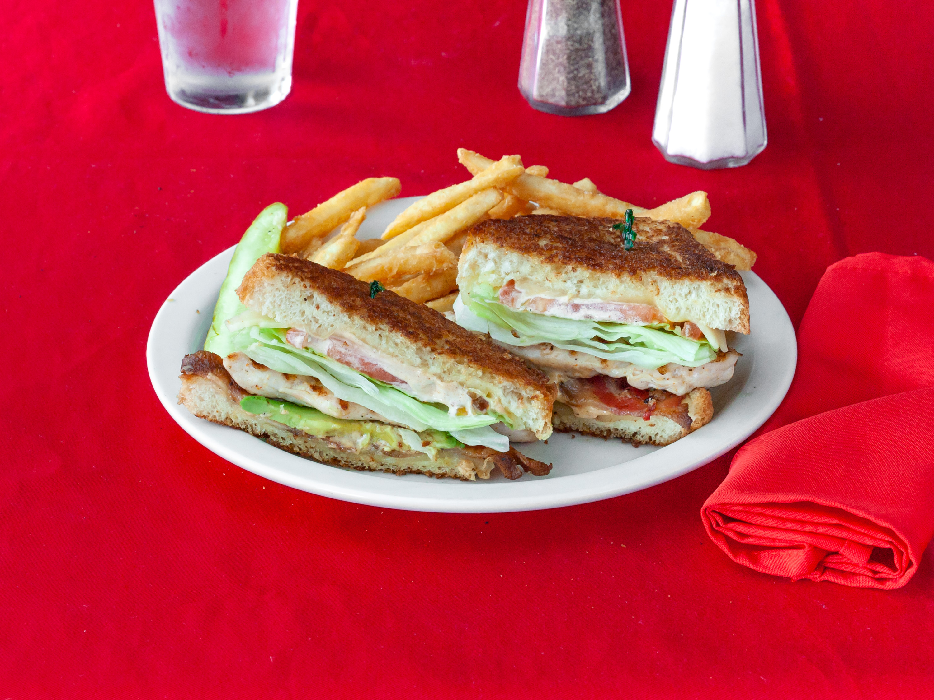 Order Chicken Avocado Club Sandwich food online from Tailgaters Sports Bar & Grill store, Bolingbrook on bringmethat.com