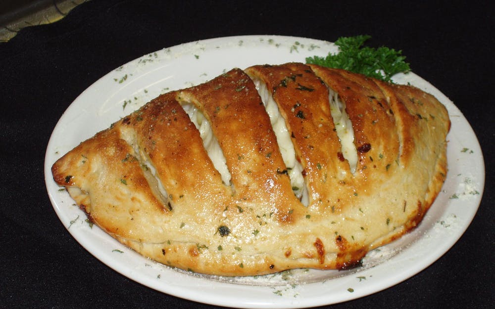 Order Cheese Calzone - Small food online from Roma Pizza & Pasta store, Nashville on bringmethat.com