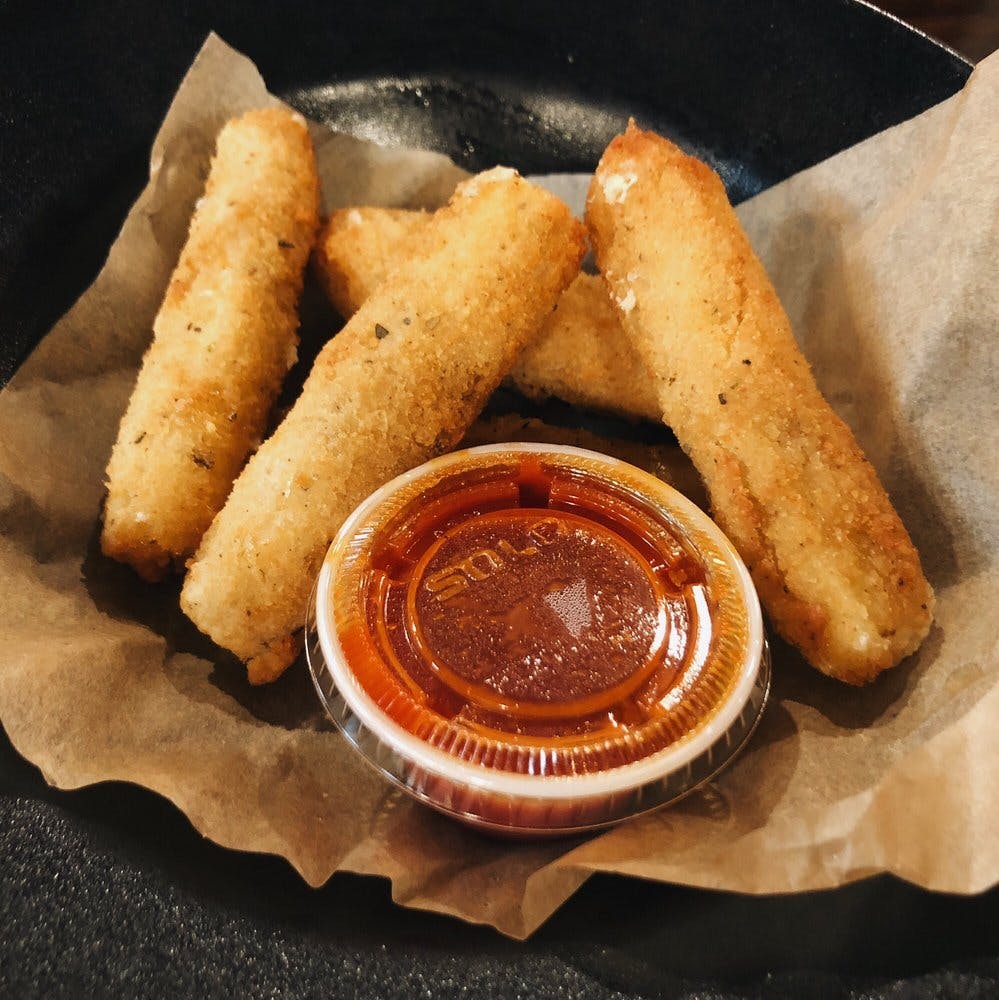 Order Plant Based Mozzarella Sticks - 5 Pieces food online from That Pizza Place In Levittown store, Levittown on bringmethat.com