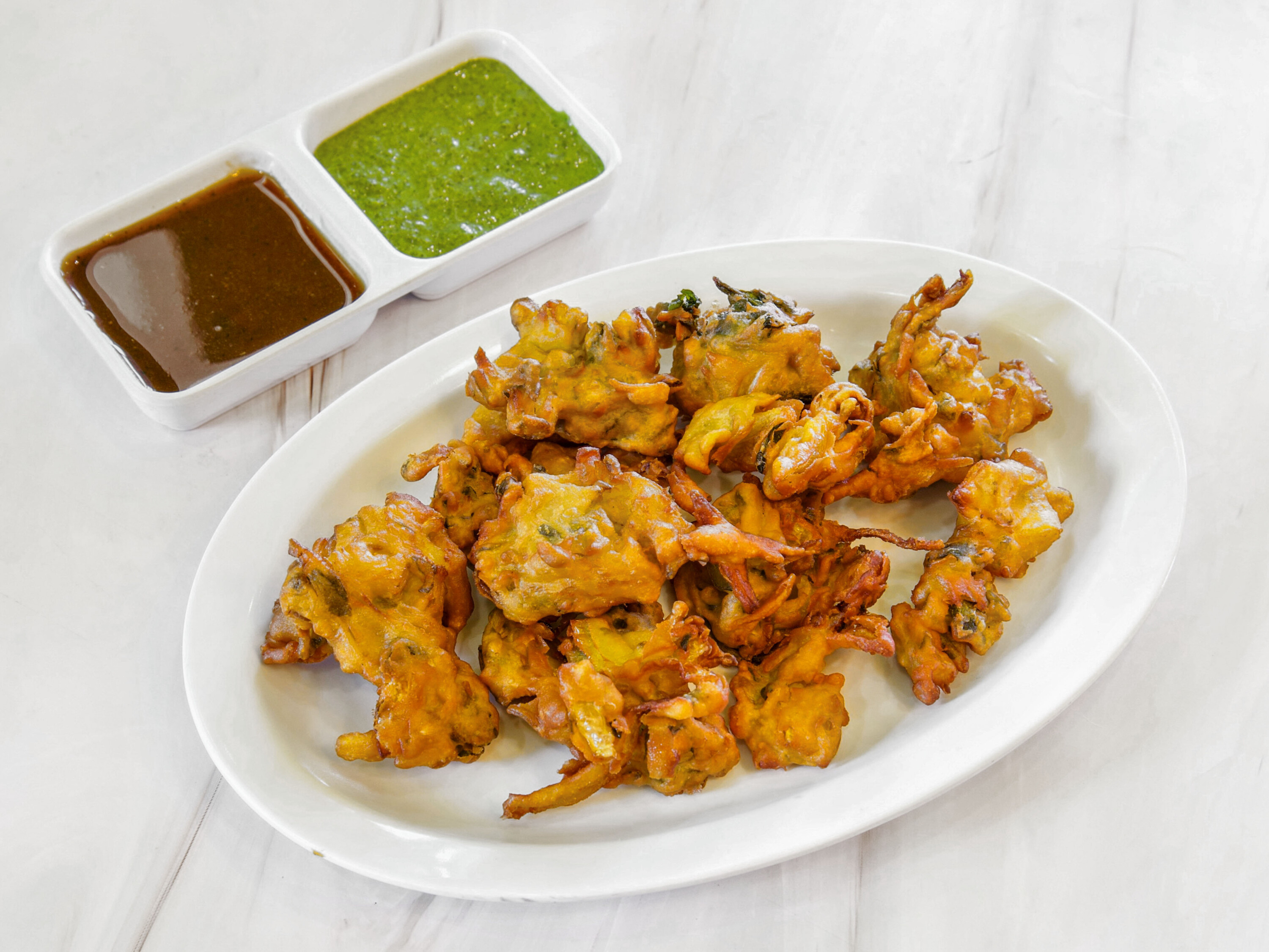 Order Mix Veg. Pakoda/Bhajia food online from Rajwadi Thali Chaat & Sweets store, Fremont on bringmethat.com