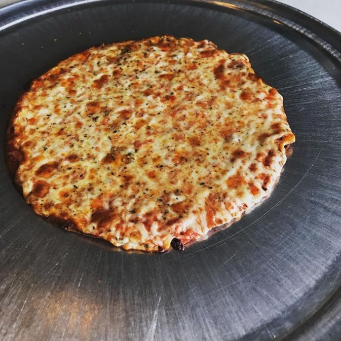 Order Gluten Free Cauliflower Crust Pizza - 10" food online from Rocco store, Bedminster on bringmethat.com