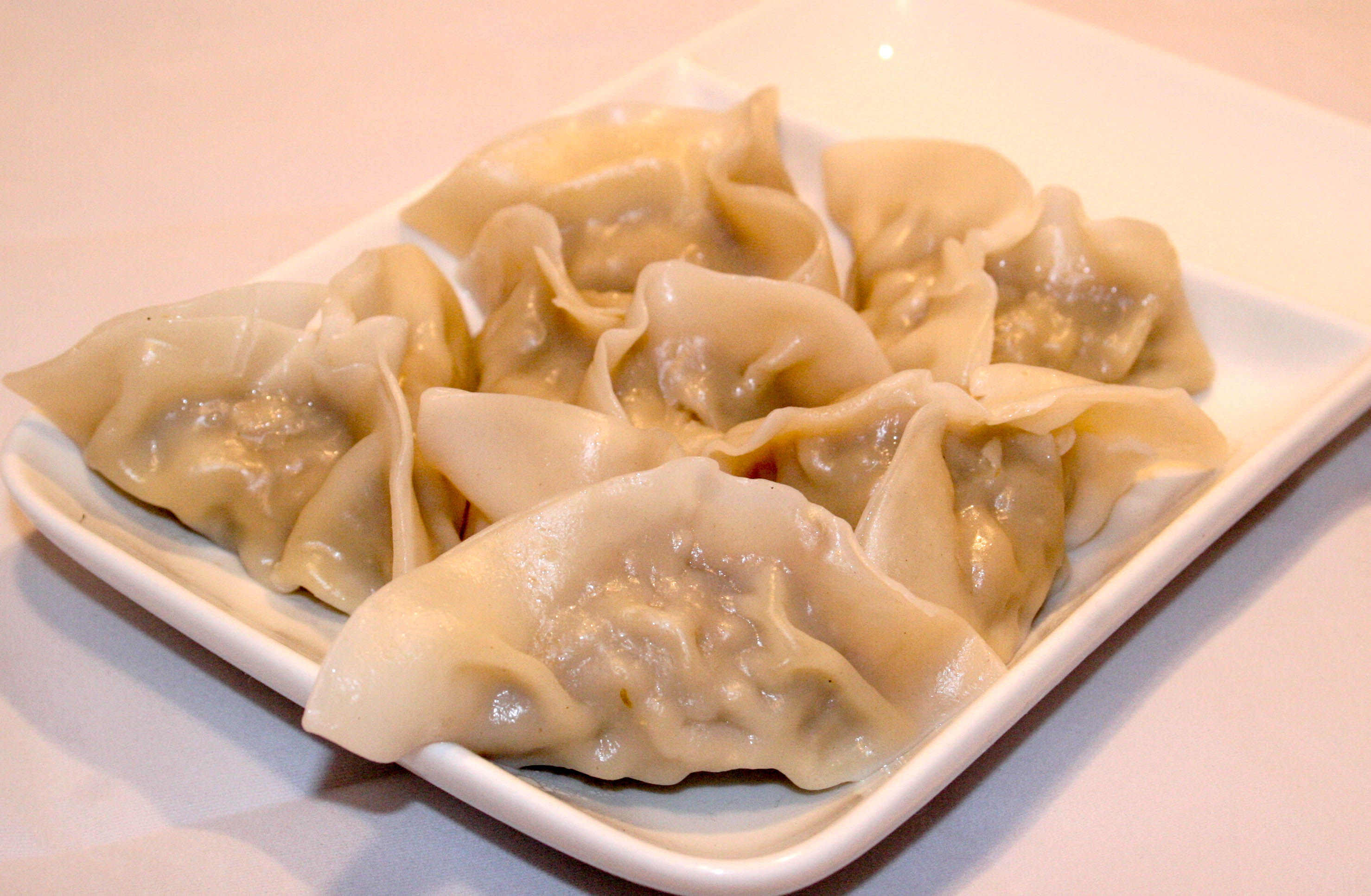 Order 4. Steamed Pork Dumpling food online from Royal Buffet Sushi Grill store, Youngstown on bringmethat.com