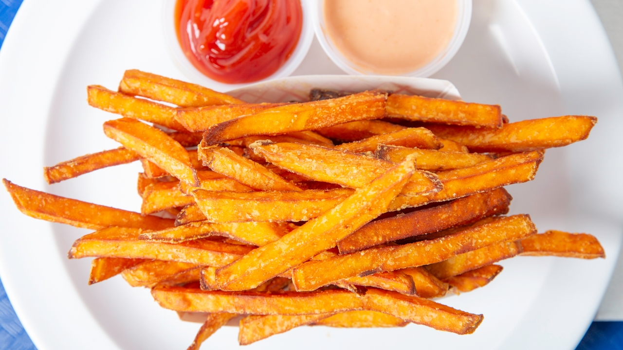 Order Sweet Potato Fries food online from Out of the Park Burgers store, Central Islip on bringmethat.com