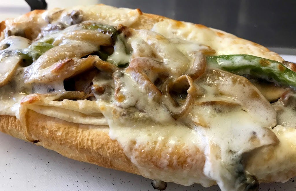 Order Philly Steak Sub - Sub food online from Broadway Pizza & Subs store, West Palm Beach on bringmethat.com