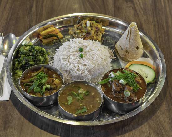 Order Chicken Thakali Thali food online from Everest Restaurant store, Irving on bringmethat.com