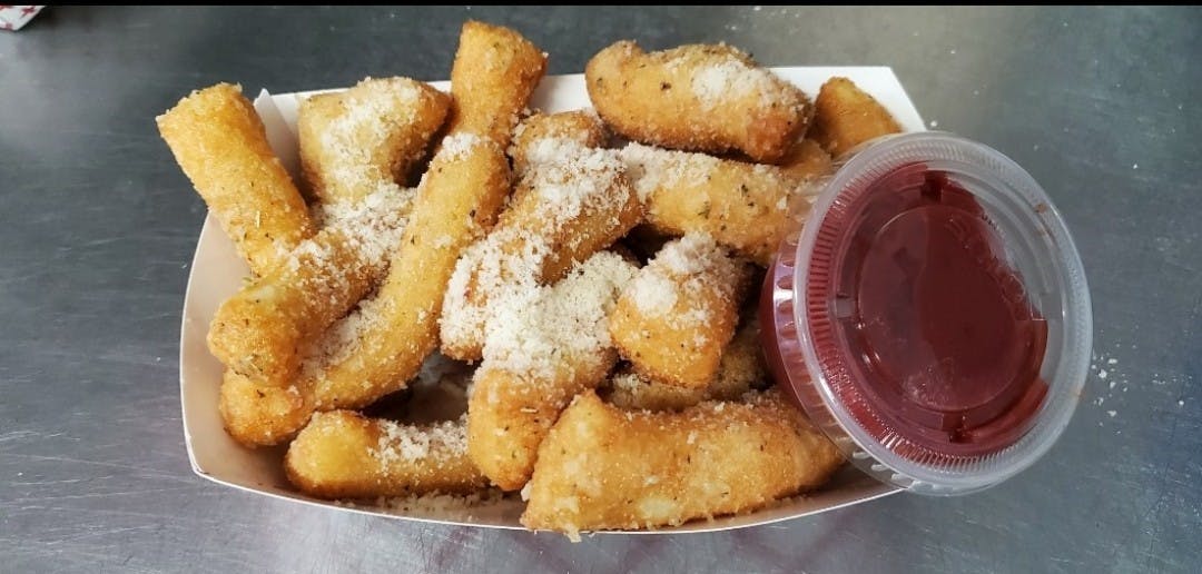 Order Parmesan Sticks - Appetizer food online from Northside Pizza store, Hastings on bringmethat.com