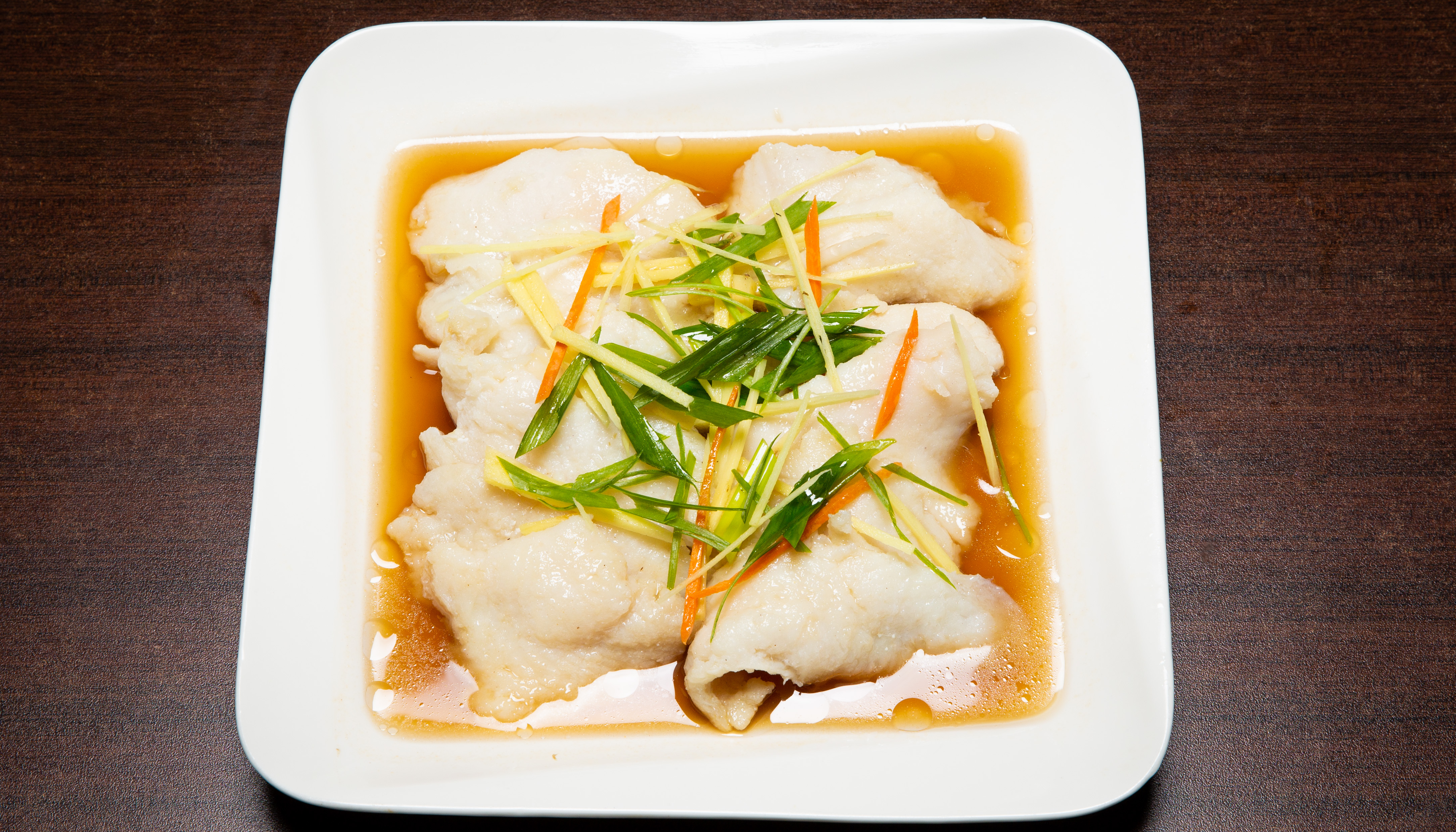 Order 4. Steamed Fish Fillet w/ Ginger Scallion Sauce food online from Wei Buffet store, Roselle Park on bringmethat.com