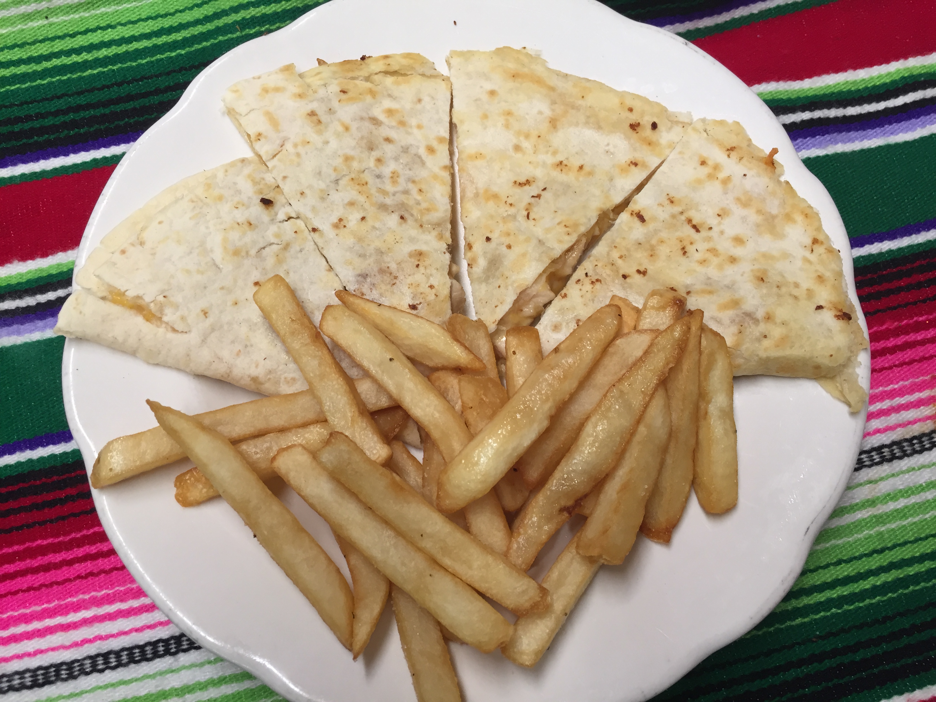 Order KIDS MINI CHICKEN QUESADILLA food online from Montes Cafe store, Seaside Heights on bringmethat.com
