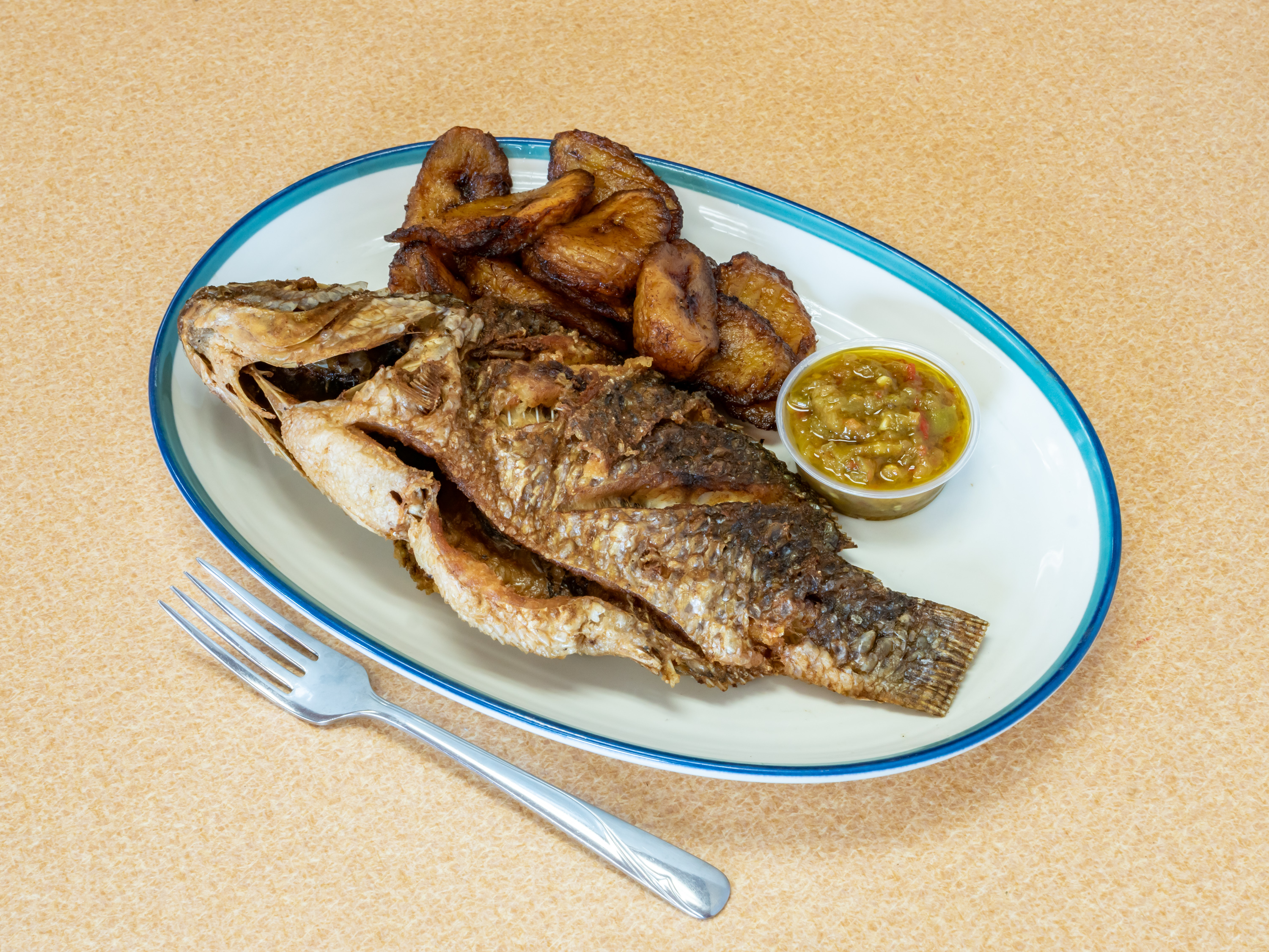 Order Tilapia and plantain only food online from Toni's African Deli store, Crystal on bringmethat.com