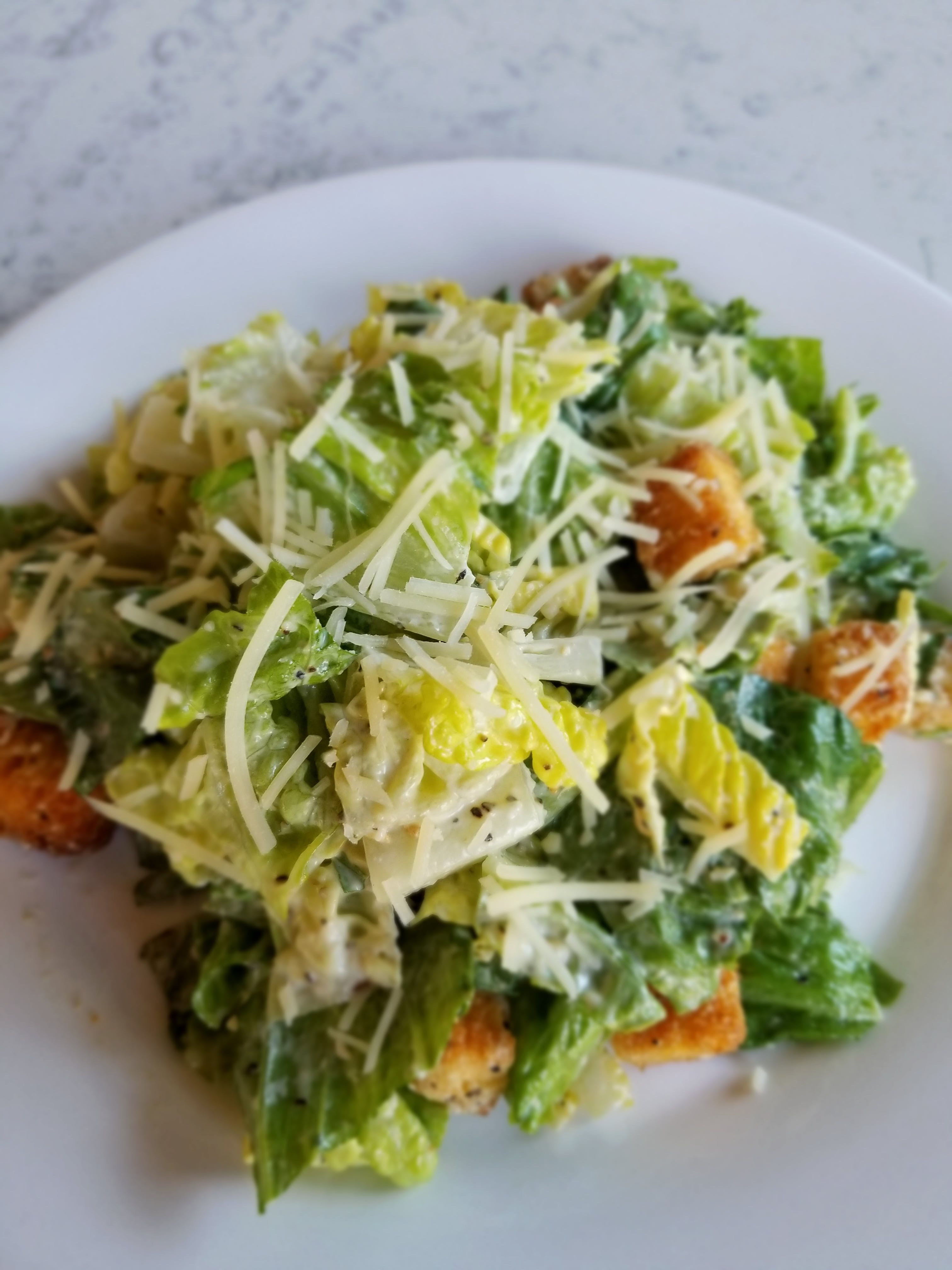 Order Caesar Salad - Salad food online from Lucco Cucina & Bar store, Florham Park on bringmethat.com