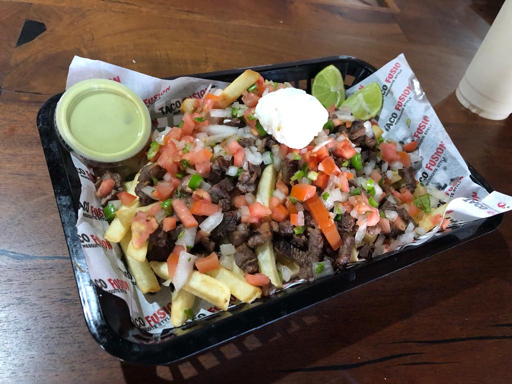 Order CARNE ASADA FRIES food online from Taco Fusion store, Glendale on bringmethat.com