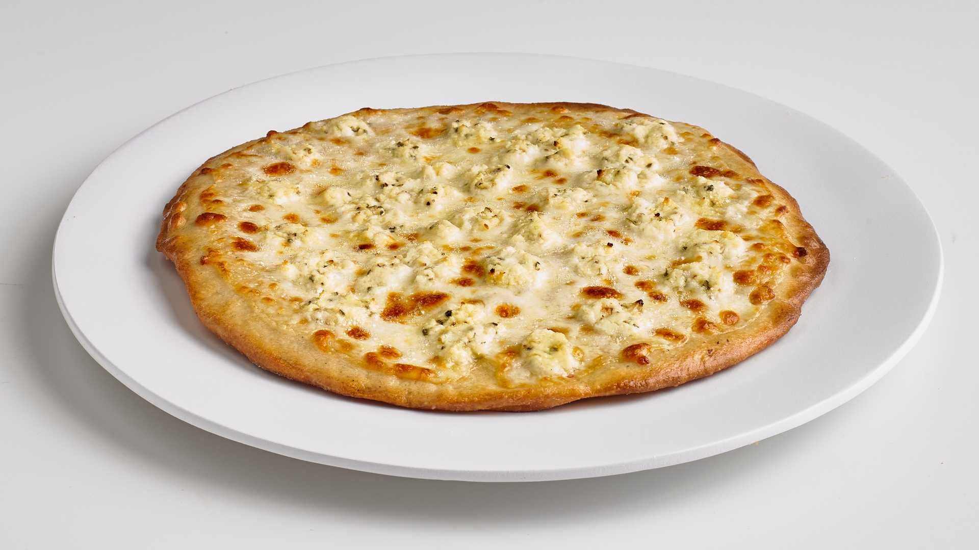 Order NY White Pizza - 12 Slices food online from Boston Restaurant & Sports Bar store, Citrus Heights on bringmethat.com