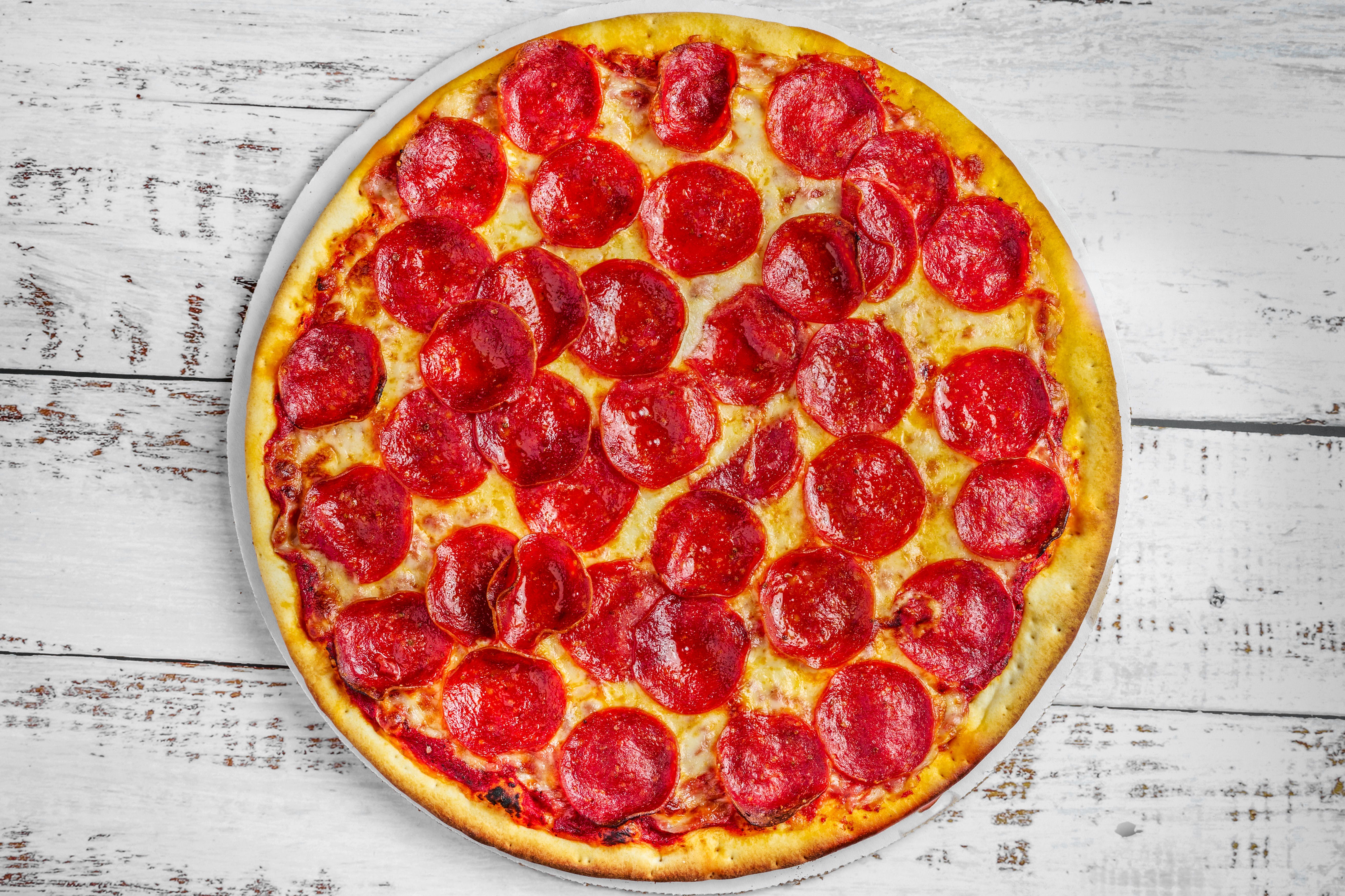 Order Cheese Pizza With One Topping - Small 12''  (Serves 1-2 People) food online from Cochiaro's Pizza store, Northlake on bringmethat.com