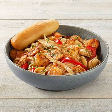 Order Cajun Shrimp & Chicken Pasta food online from Tgi Friday store, Cincinnati on bringmethat.com