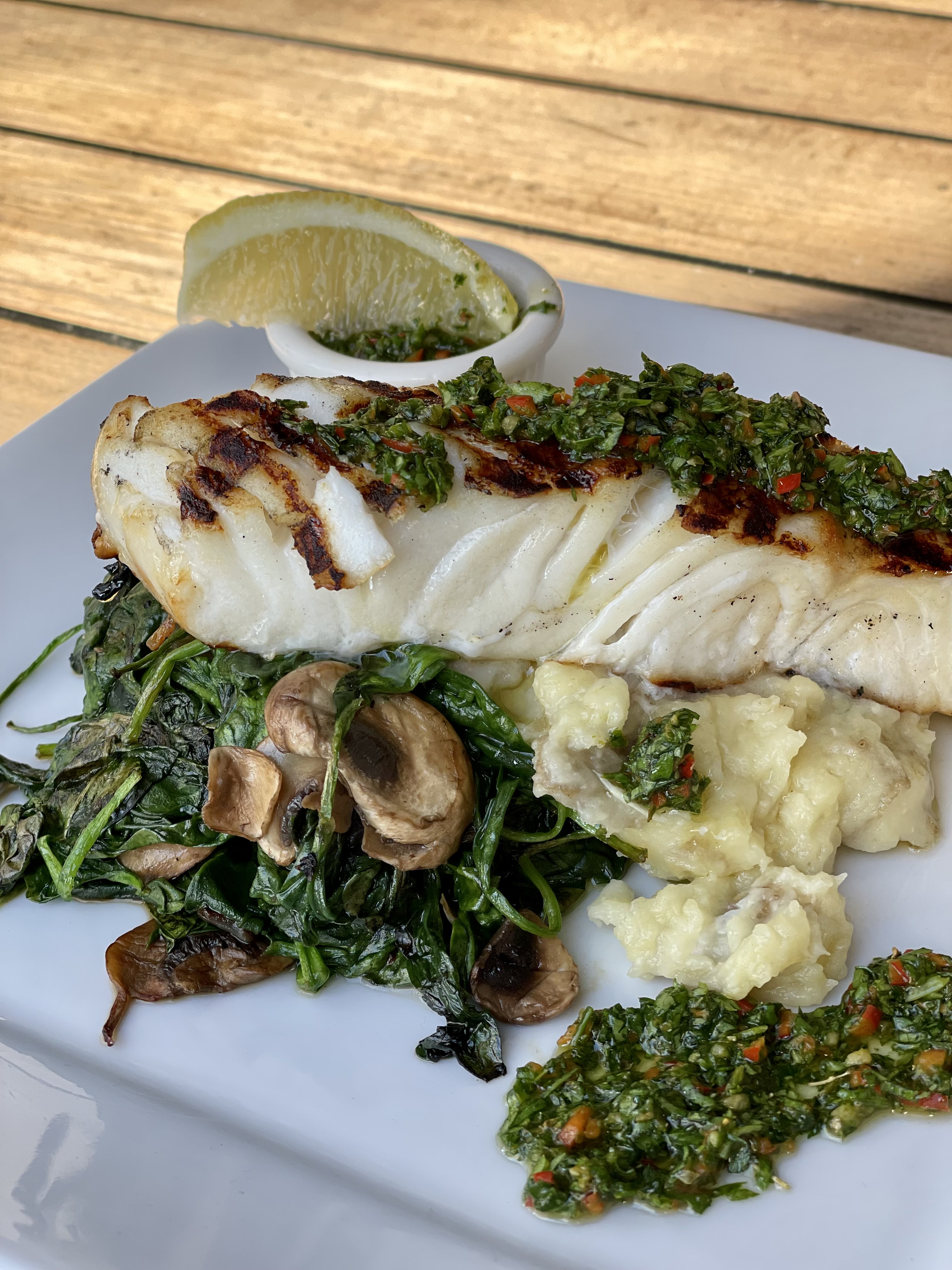 Order Grilled Sea Bass food online from Gg Bistro store, Laguna Beach on bringmethat.com