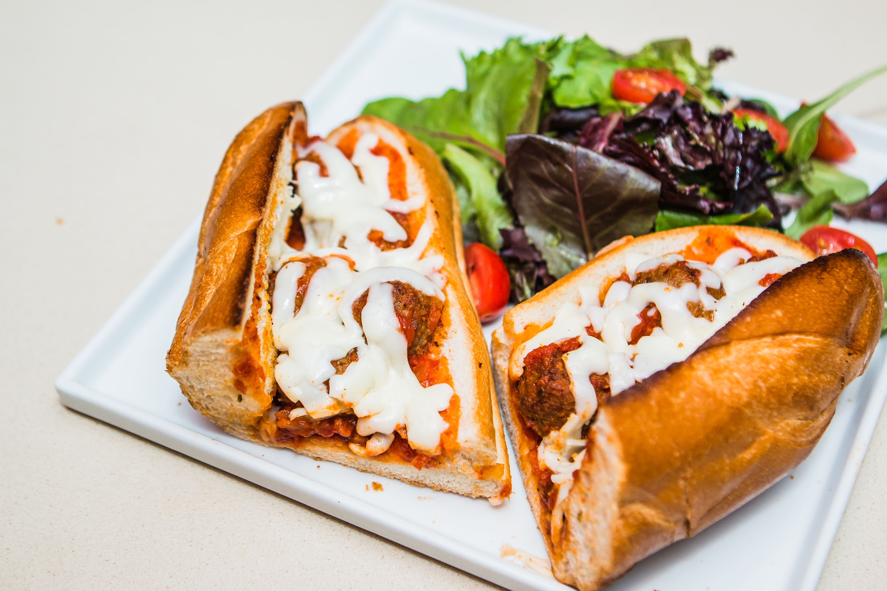 Order Meatball Hero Sandwich food online from Panini Pizza & Italian Kitchen store, West Hollywood on bringmethat.com