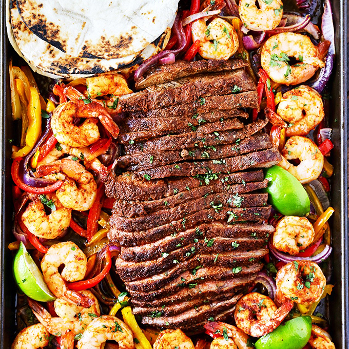 Order Shrimp and Steak Fajitas food online from Tortuga's Mexican Village store, Princeton on bringmethat.com