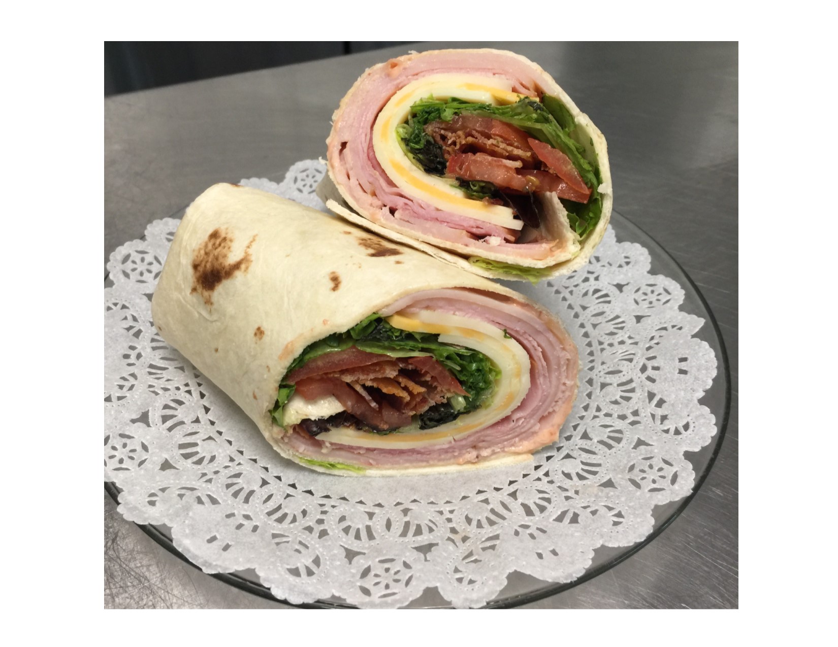 Order Turkey Club Ranch Wrap Sandwich food online from Miss Hickory Tea Room store, Strongsville on bringmethat.com