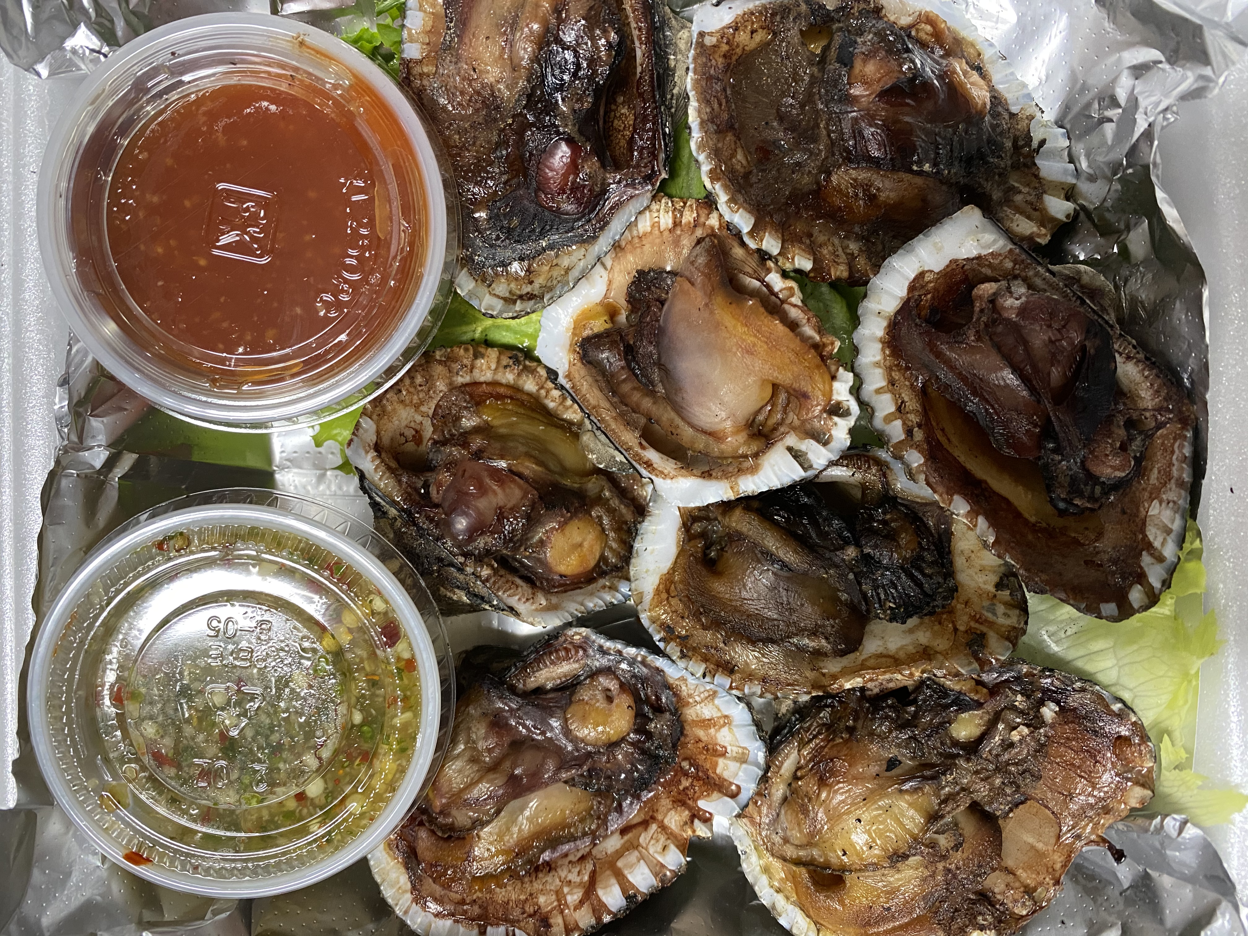 Order Grilled Bloody Clam  food online from Cajun Seafood House store, Los Angeles on bringmethat.com