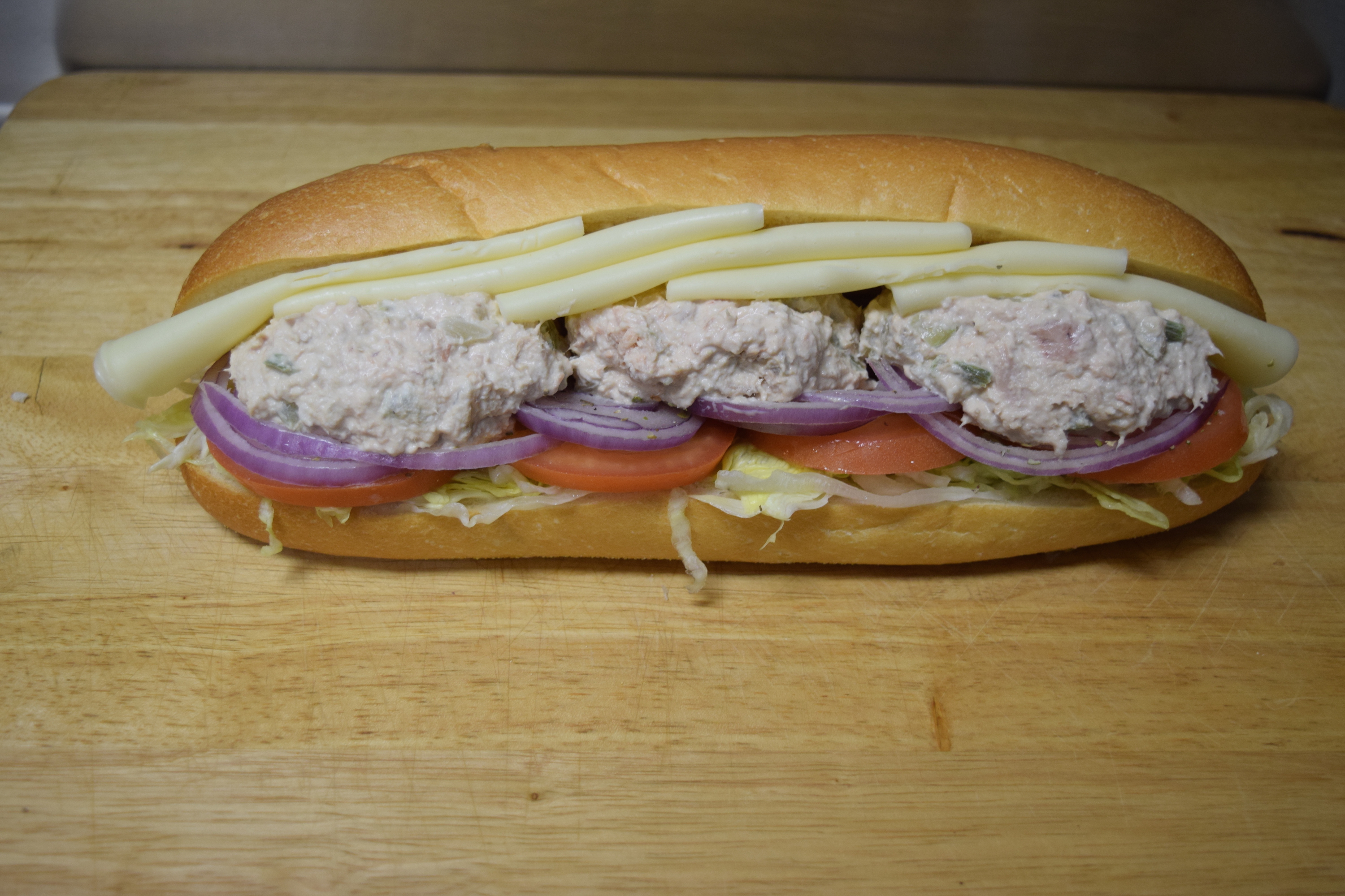 Order Tuna and Cheese Sub food online from Cuzino Pizza & Pasta store, North East on bringmethat.com