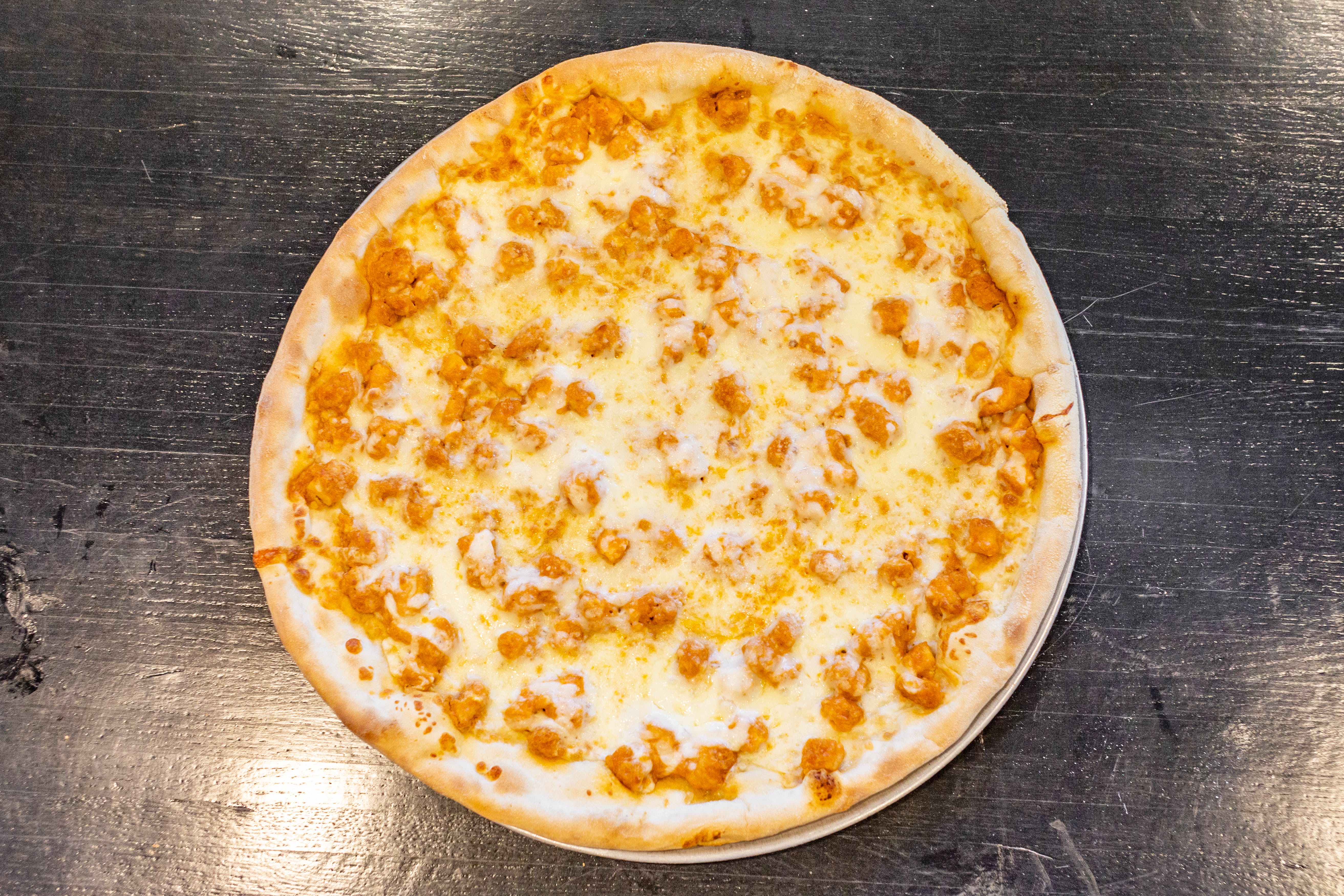 Order Buffalo Chicken Pizza - Medium 14'' food online from Joey's Pizza store, Milford on bringmethat.com
