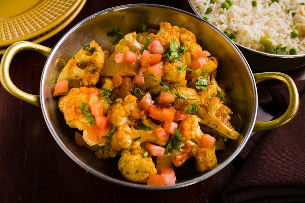 Order Tawa Aloo Gobi food online from Dhaba indian cuisine store, New York on bringmethat.com