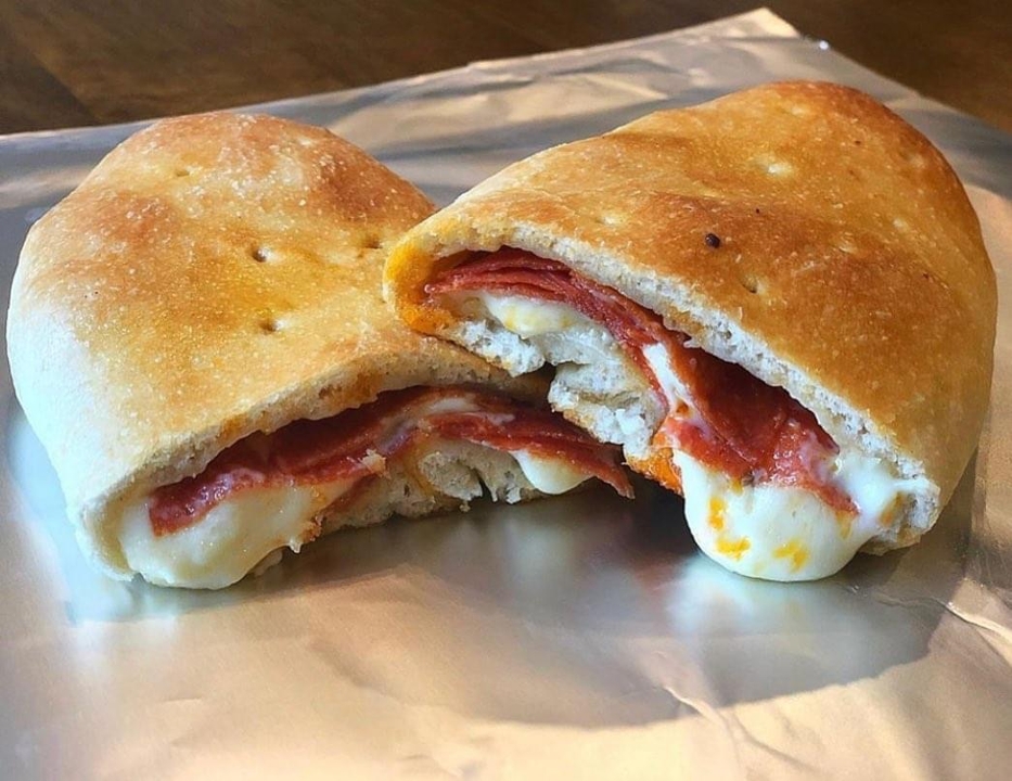 Order Pepperoni & Cheese Stuffed Bread food online from Captain’s Curbside Seafood store, Trappe on bringmethat.com