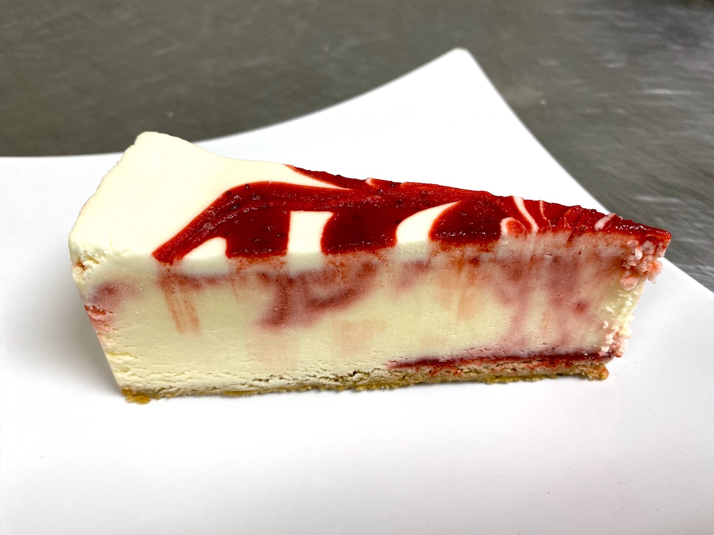 Order Strawberry Cheesecake food online from Heavenly Crust Pizza store, North Richland Hills on bringmethat.com