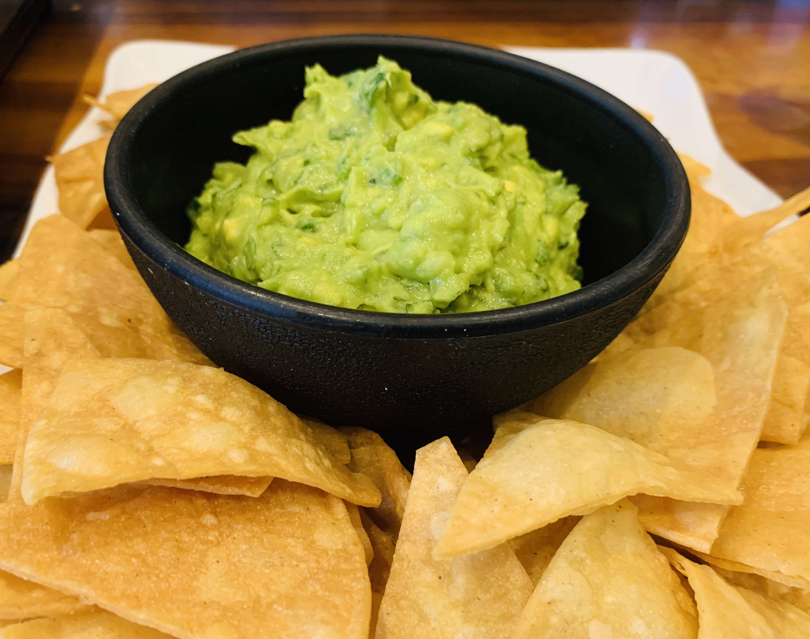 Order Corn Tortilla Chips with Guacamole food online from Sunswick 35-35 store, Astoria on bringmethat.com