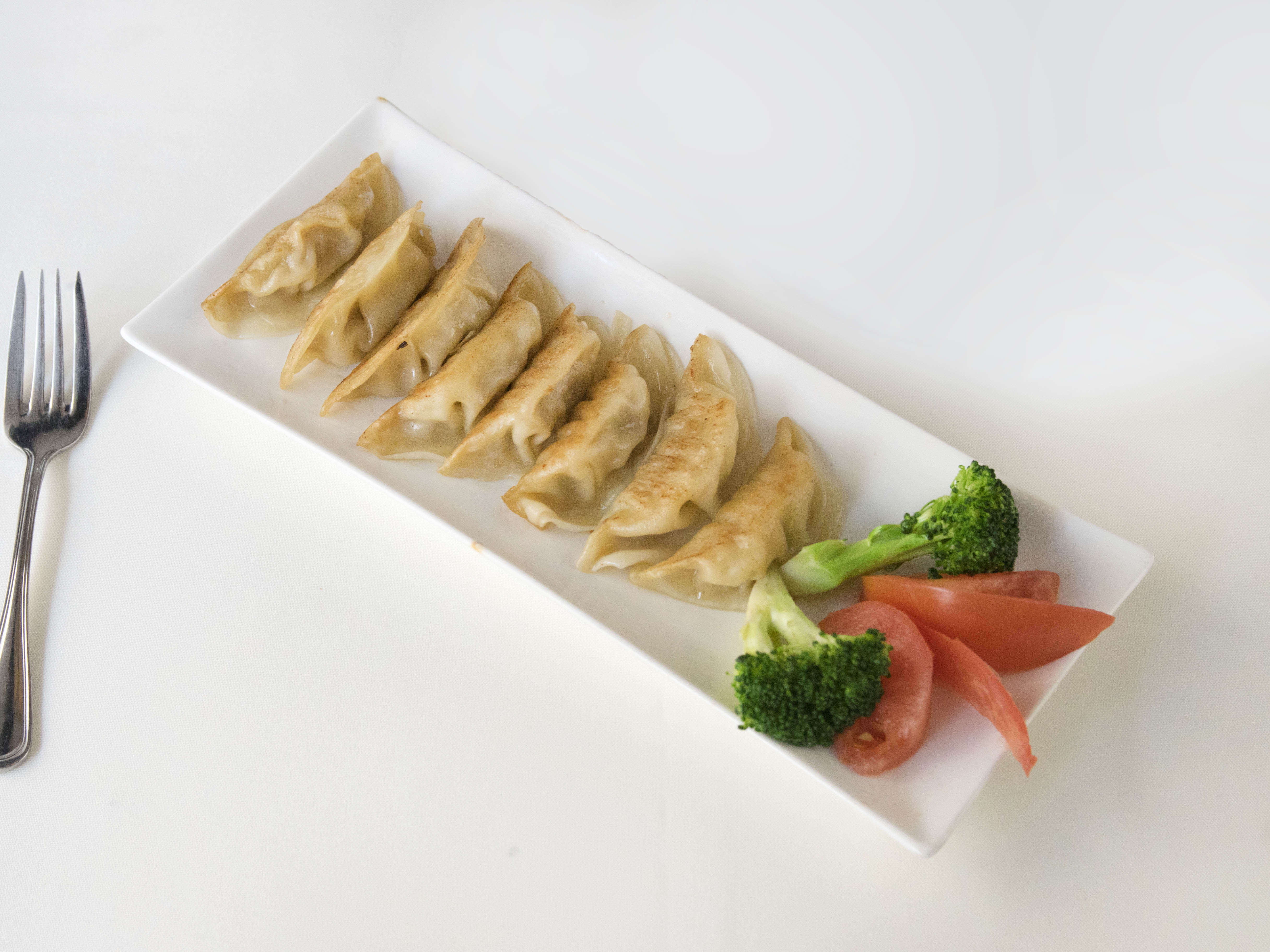 Order A1. Pot Stickers (8 pcs) food online from China Too store, San Diego on bringmethat.com