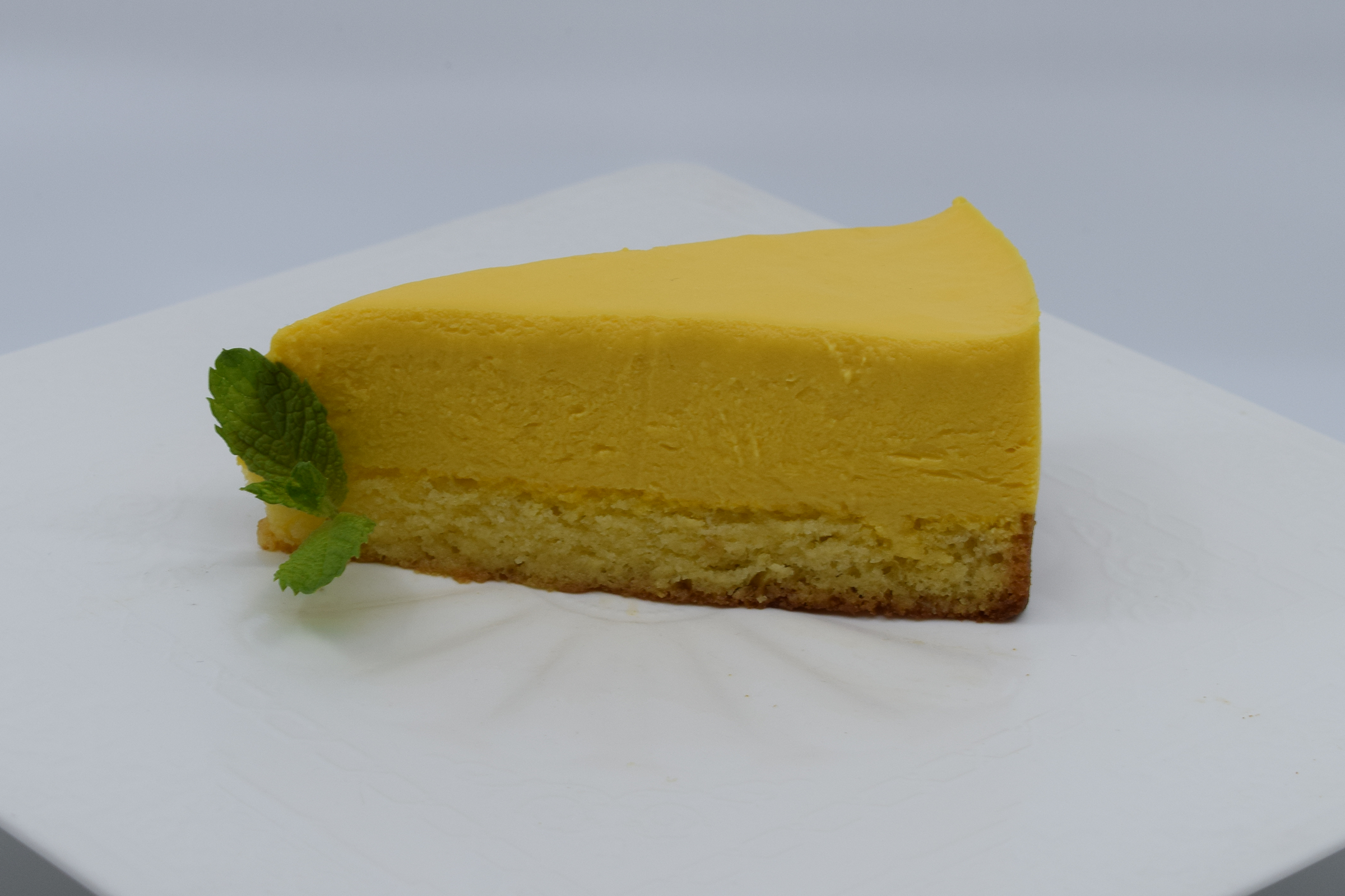 Order Cake Mango Mousse food online from The Scoop Ice Cream Spot store, San Diego on bringmethat.com