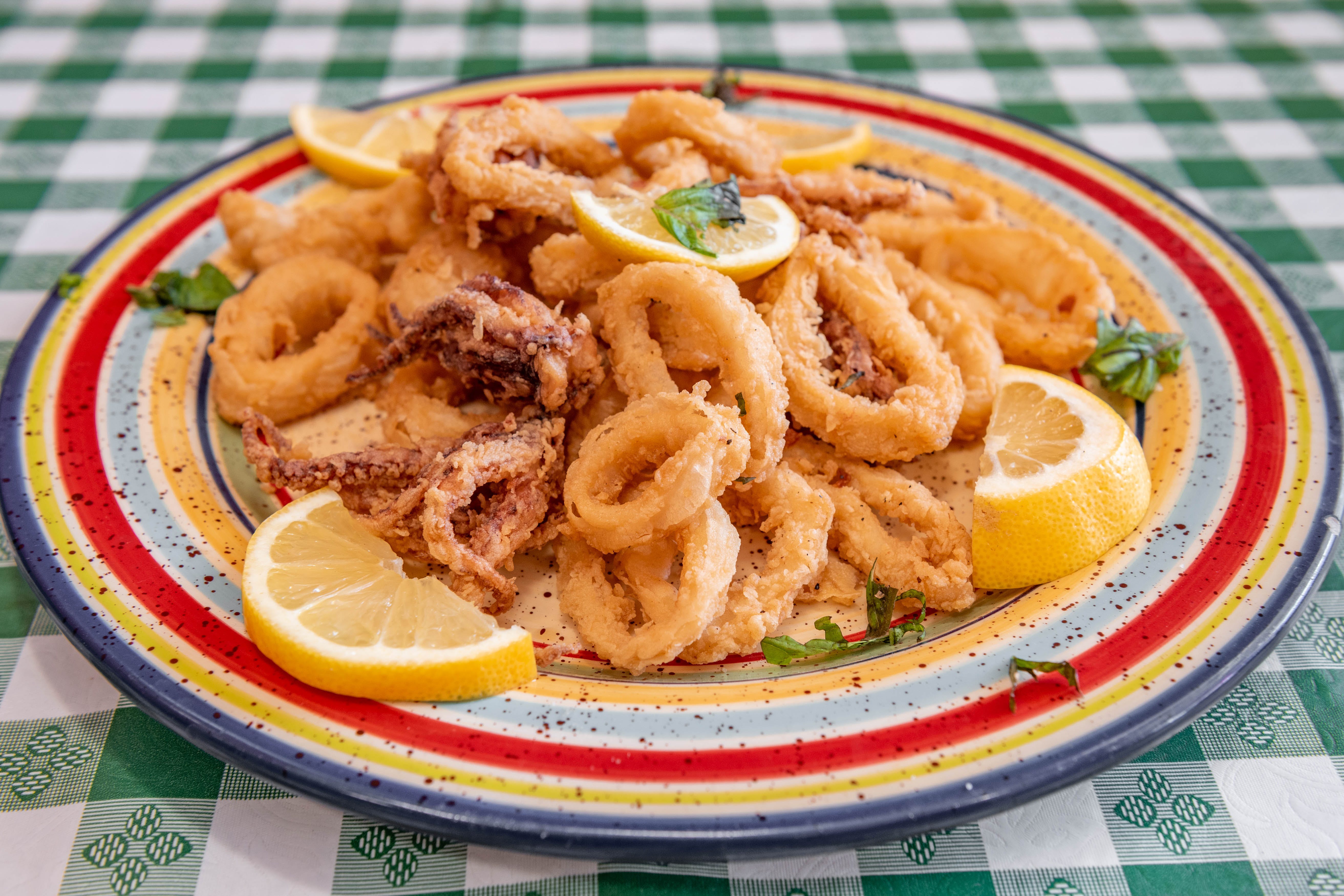 Order Fried Calamari - Appetizer food online from 5 Brothers Pizza & Pasta store, Brewster on bringmethat.com