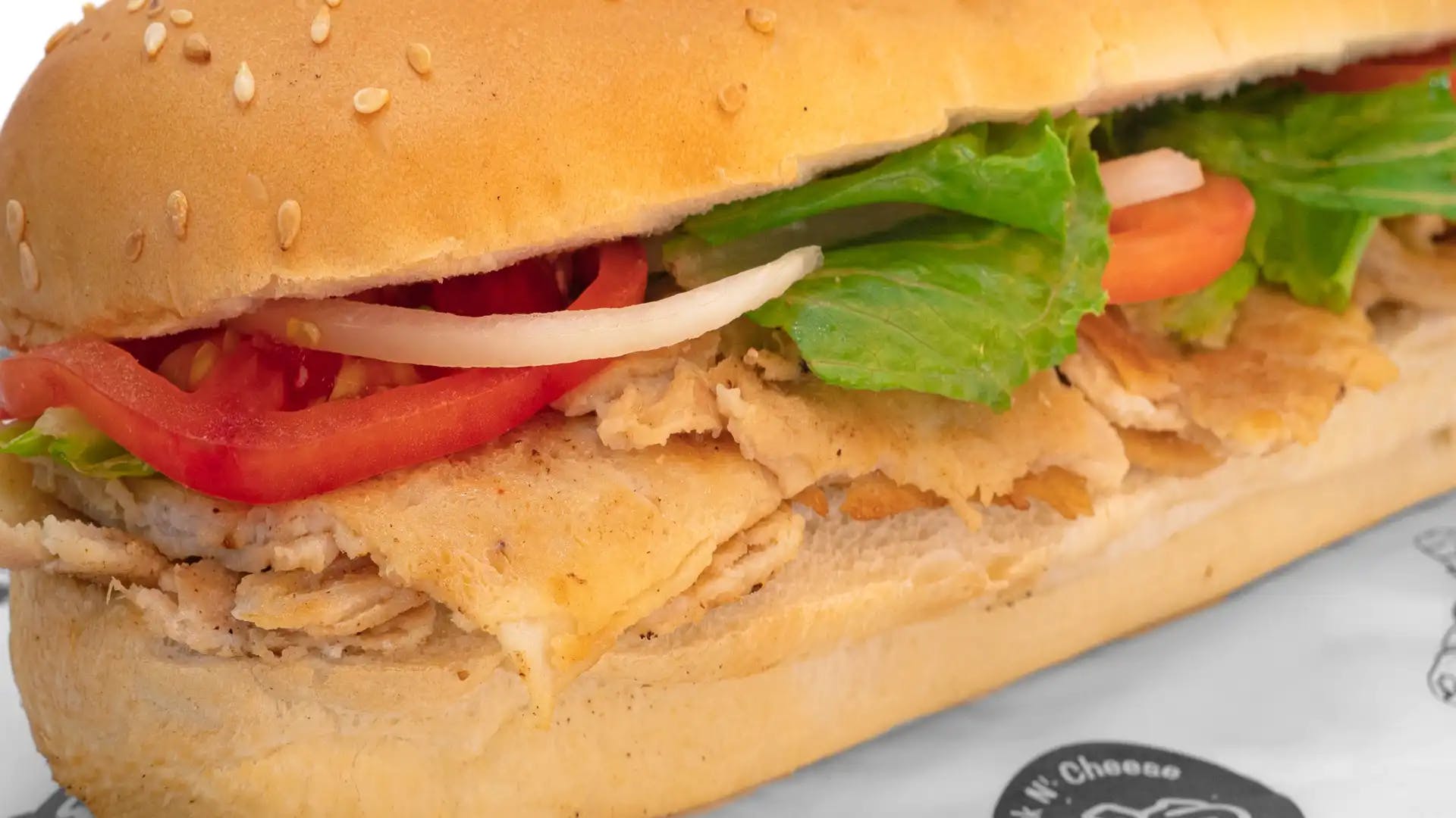 Order Grilled Chicken Sub - Small food online from Tubby's Grilled Submarines store, Westland on bringmethat.com