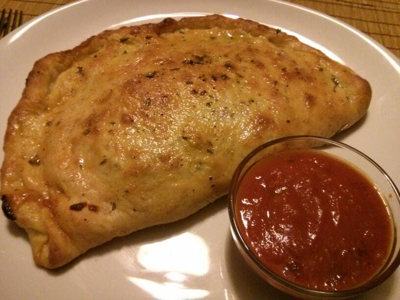 Order Deluxe Stromboli - Small food online from Tani Pizza store, Butler on bringmethat.com
