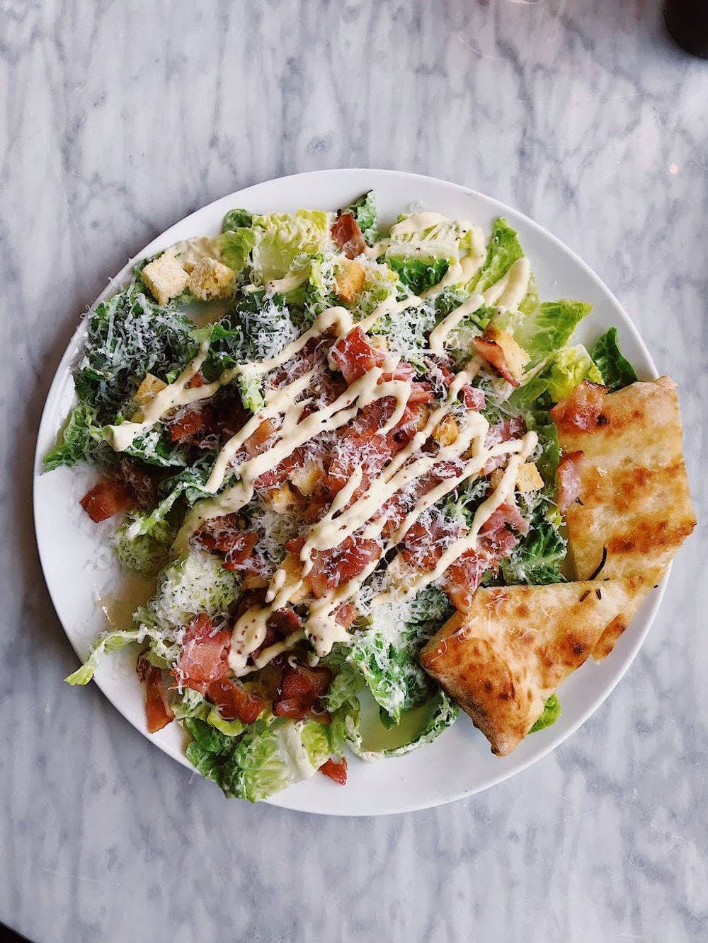 Order Caesar Salad with Grilled Chicken - Salad food online from Apollo's Family Pizzeria store, Bensalem on bringmethat.com