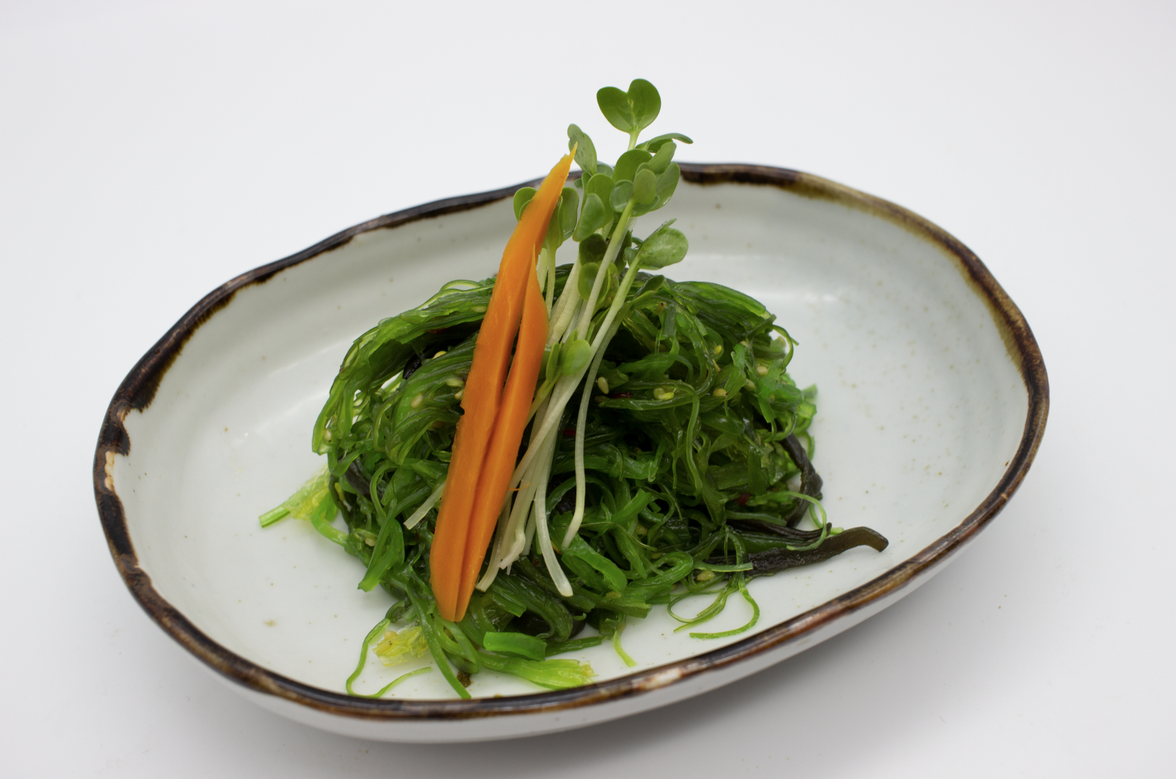 Order Seaweed Salad food online from Sushiaru store, Victorville on bringmethat.com