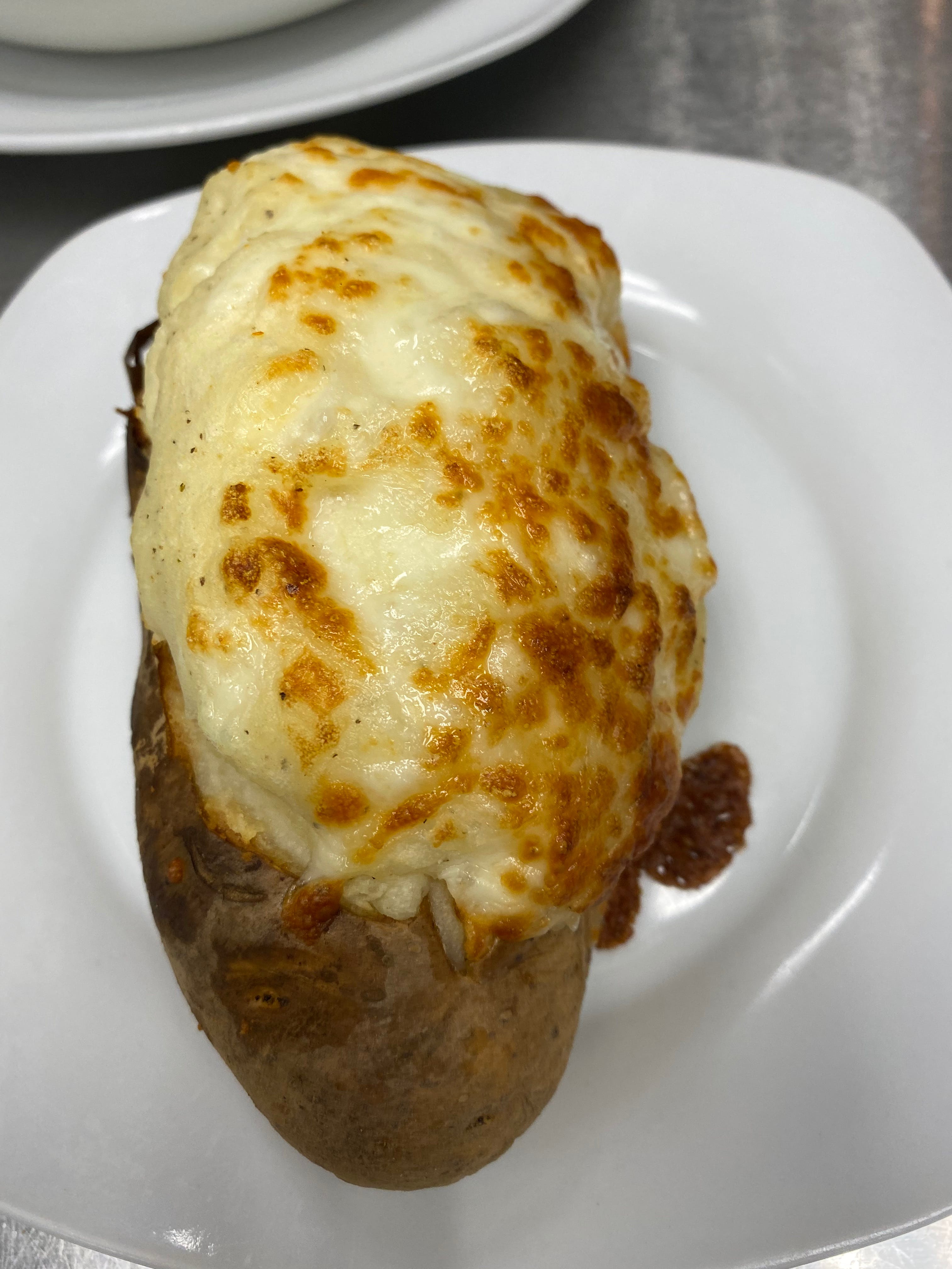 Order Twice Baked Potato - Side Twice Baked Potato food online from Pizza Mia store, Grand Blanc on bringmethat.com