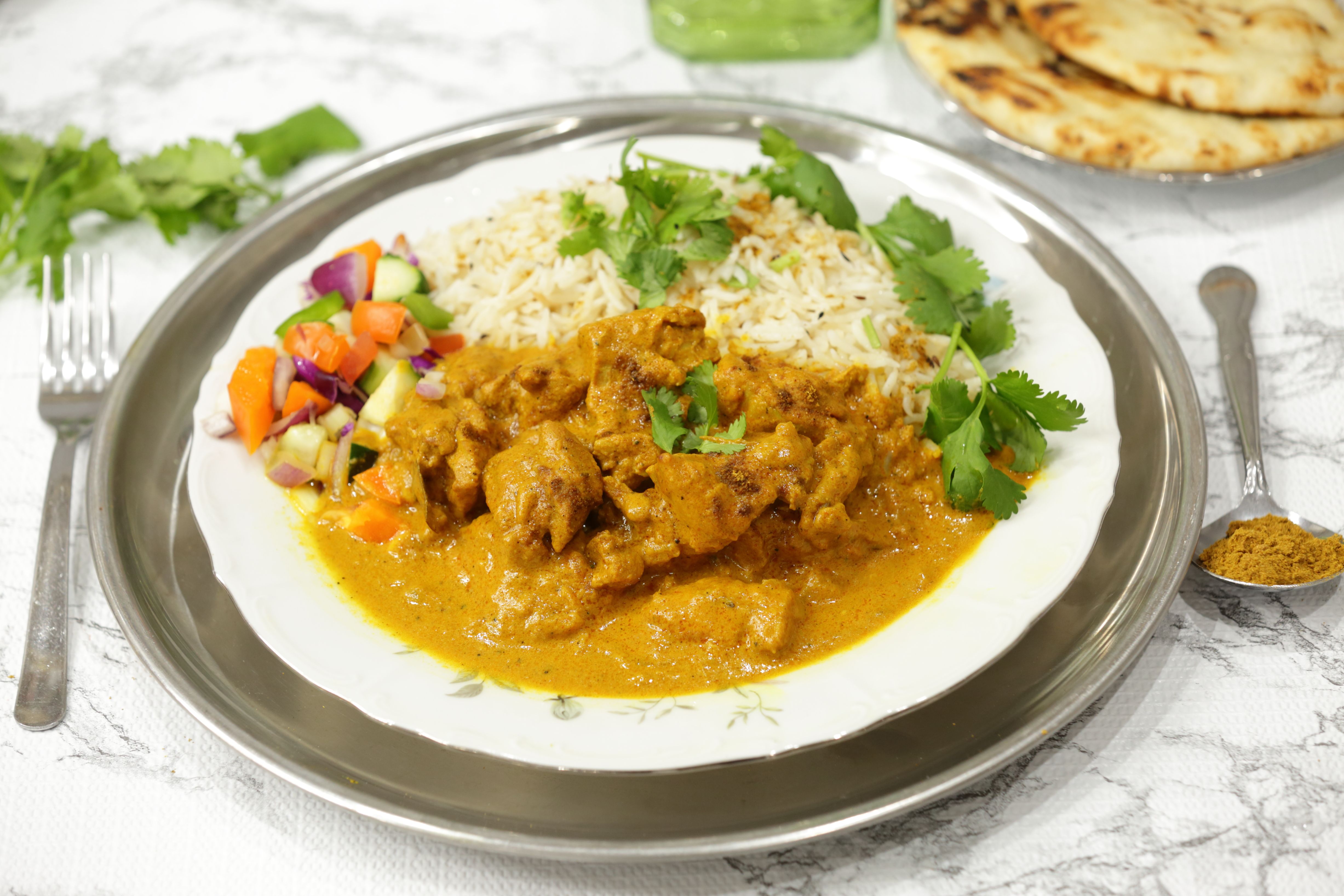 Order Chicken Curry food online from Small World Kitchen store, Detroit on bringmethat.com