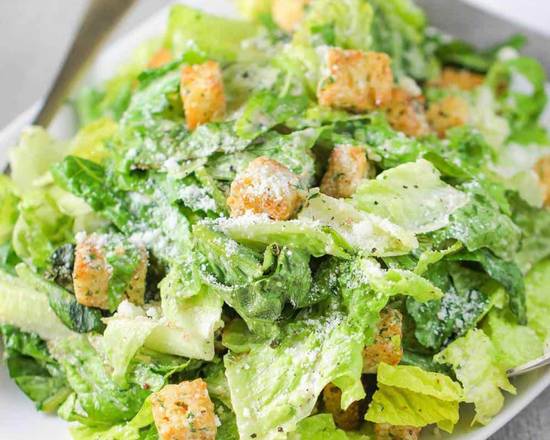 Order Caesar Salad food online from Rina's Pizzeria & Cafe store, Boston on bringmethat.com